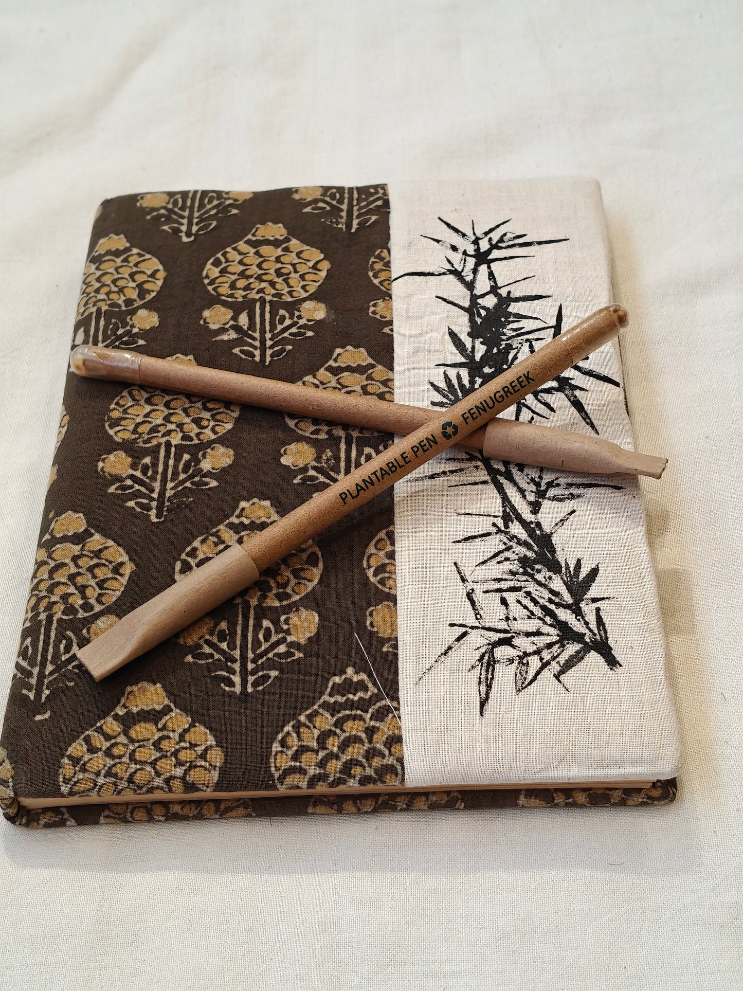 Handcrafted plantable pen with seeds at the bottom