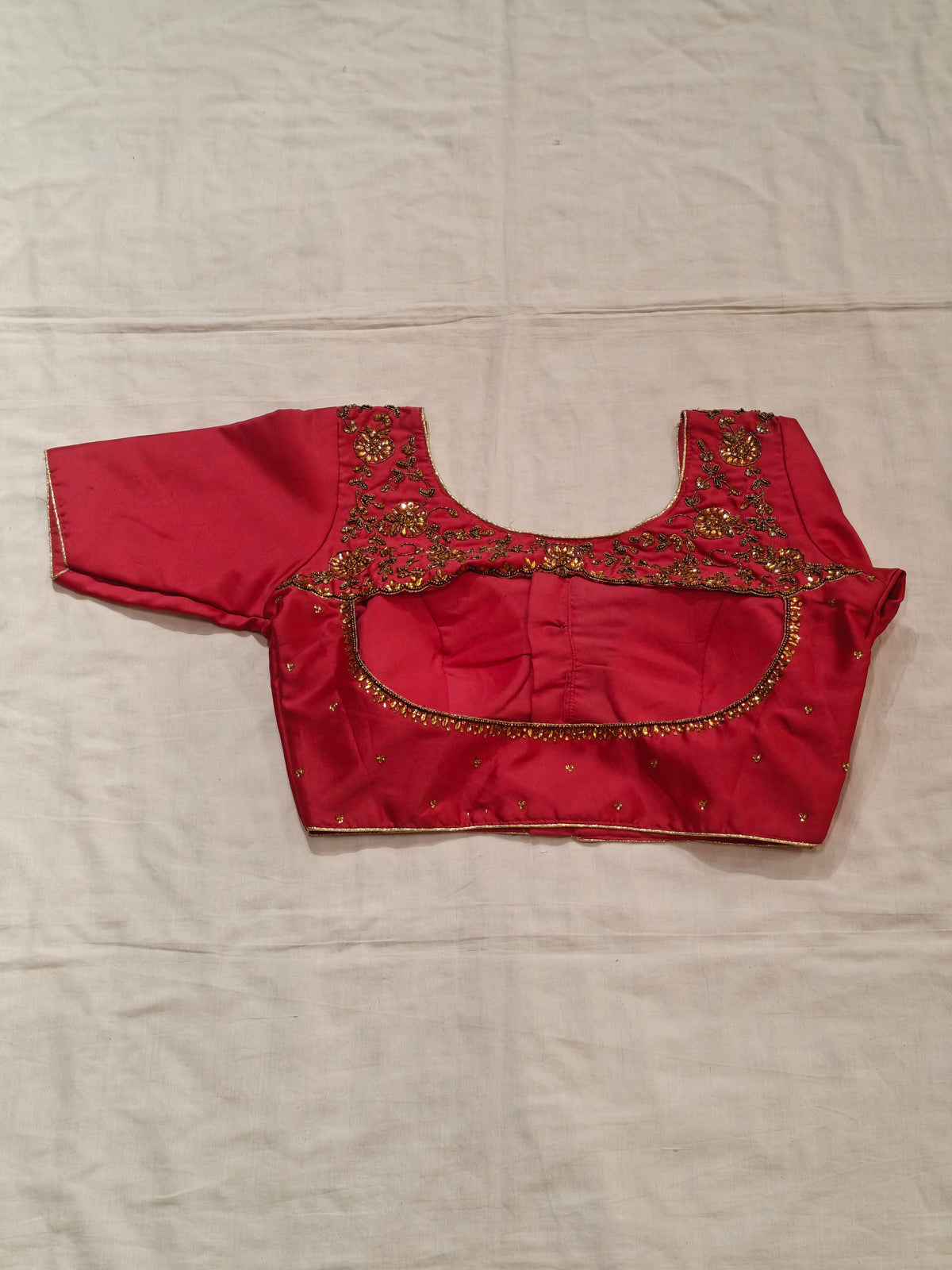 Fancy back blouse with embroidery and stone work on back