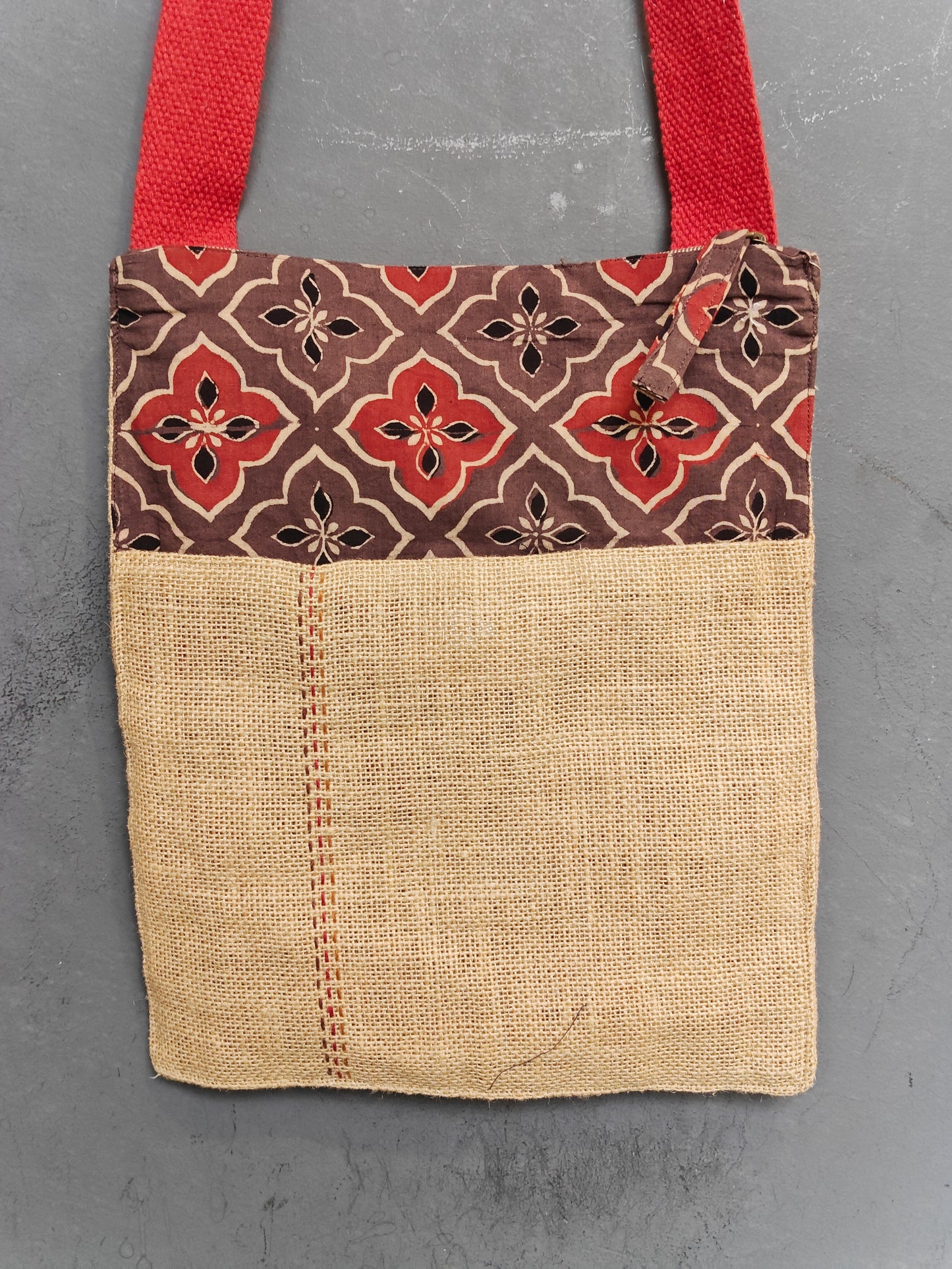 Handmade crossbody sling bag with multicolour fabric panels and jute