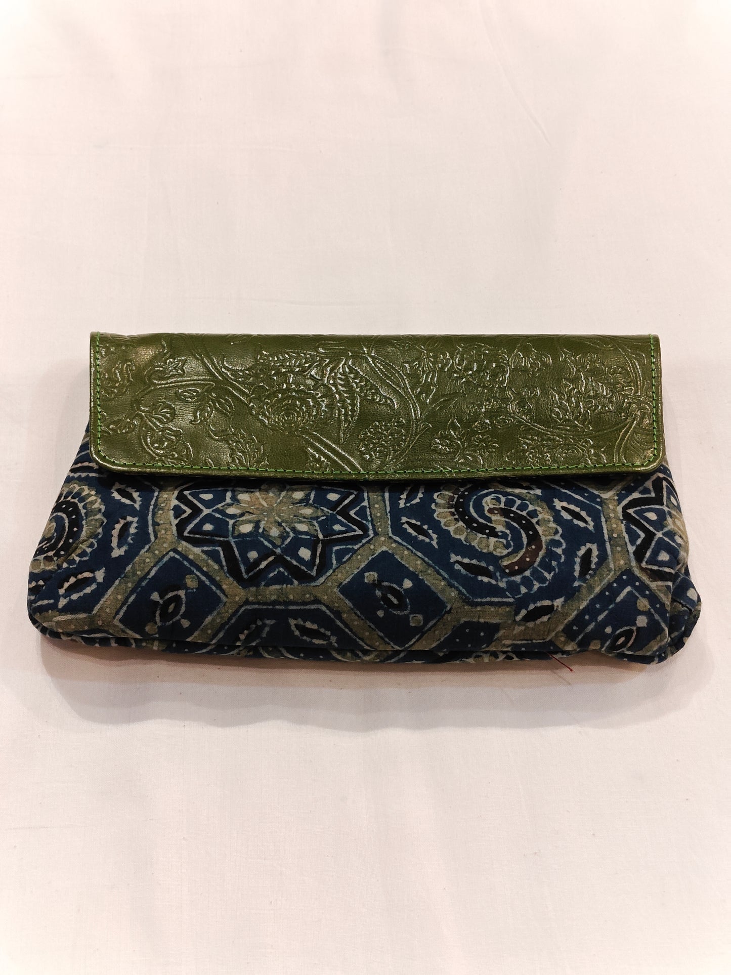 Leather hand embossed flap purse with hand block printed fabric base