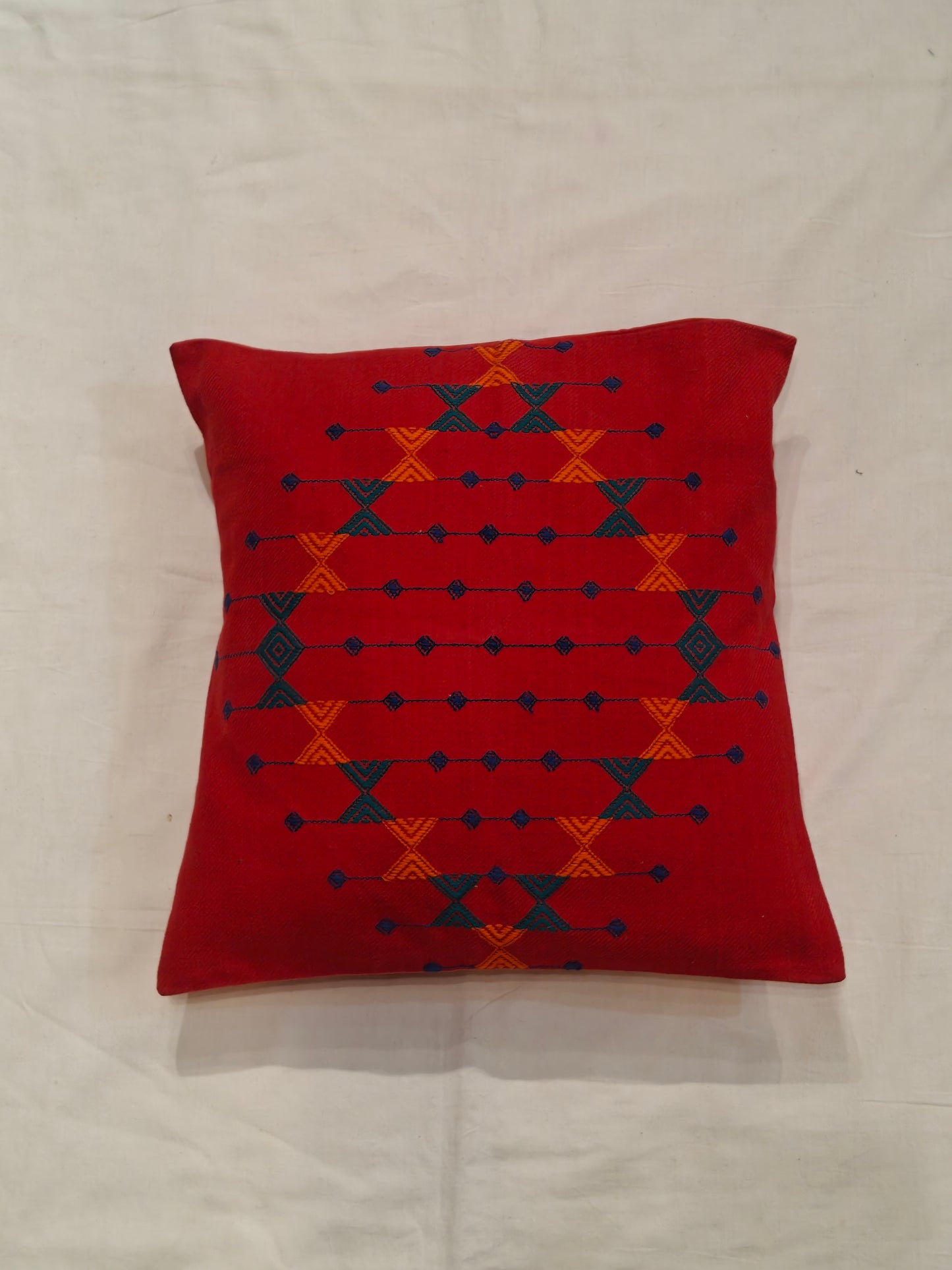 Red cotton cushion covers with geometric pattu hand weaving pattern
