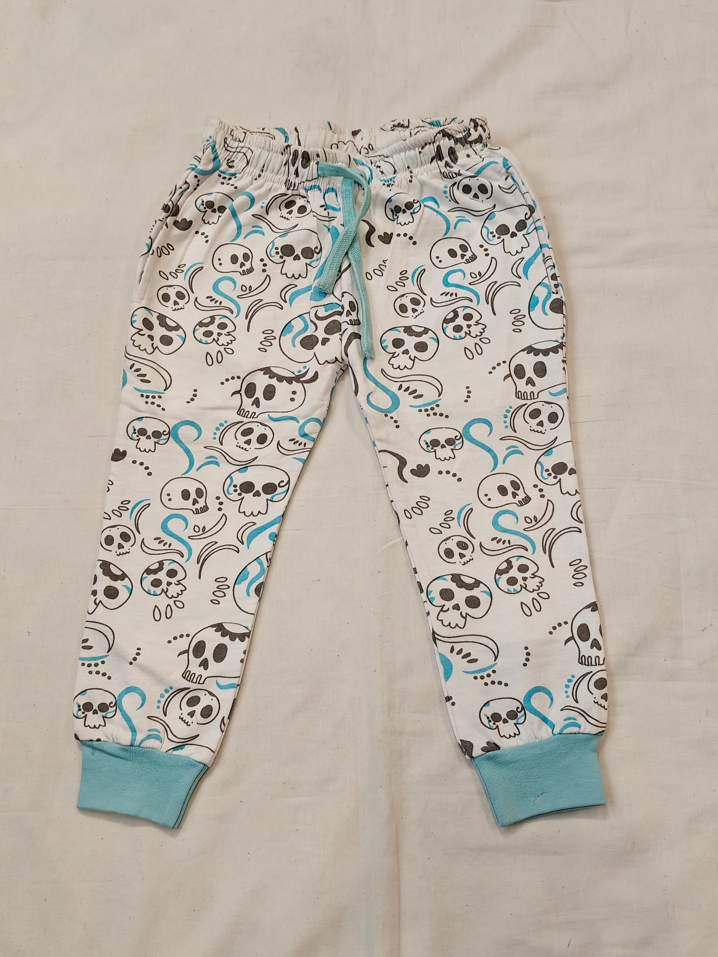 White n blue cotton jogger with skulls print for children
