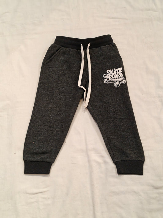 Charcoal grey cotton jogger pants with skate board print for children