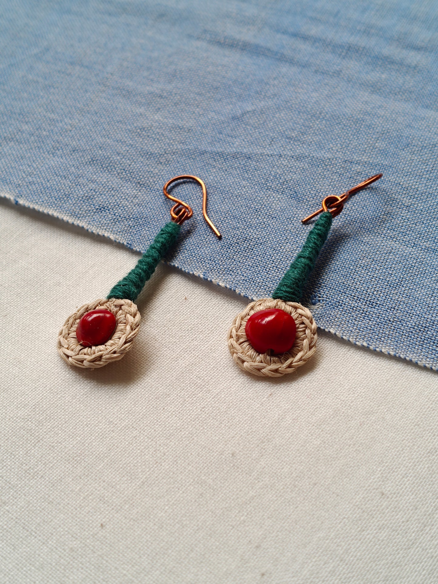 Handcrafted seed earrings with copper hooks