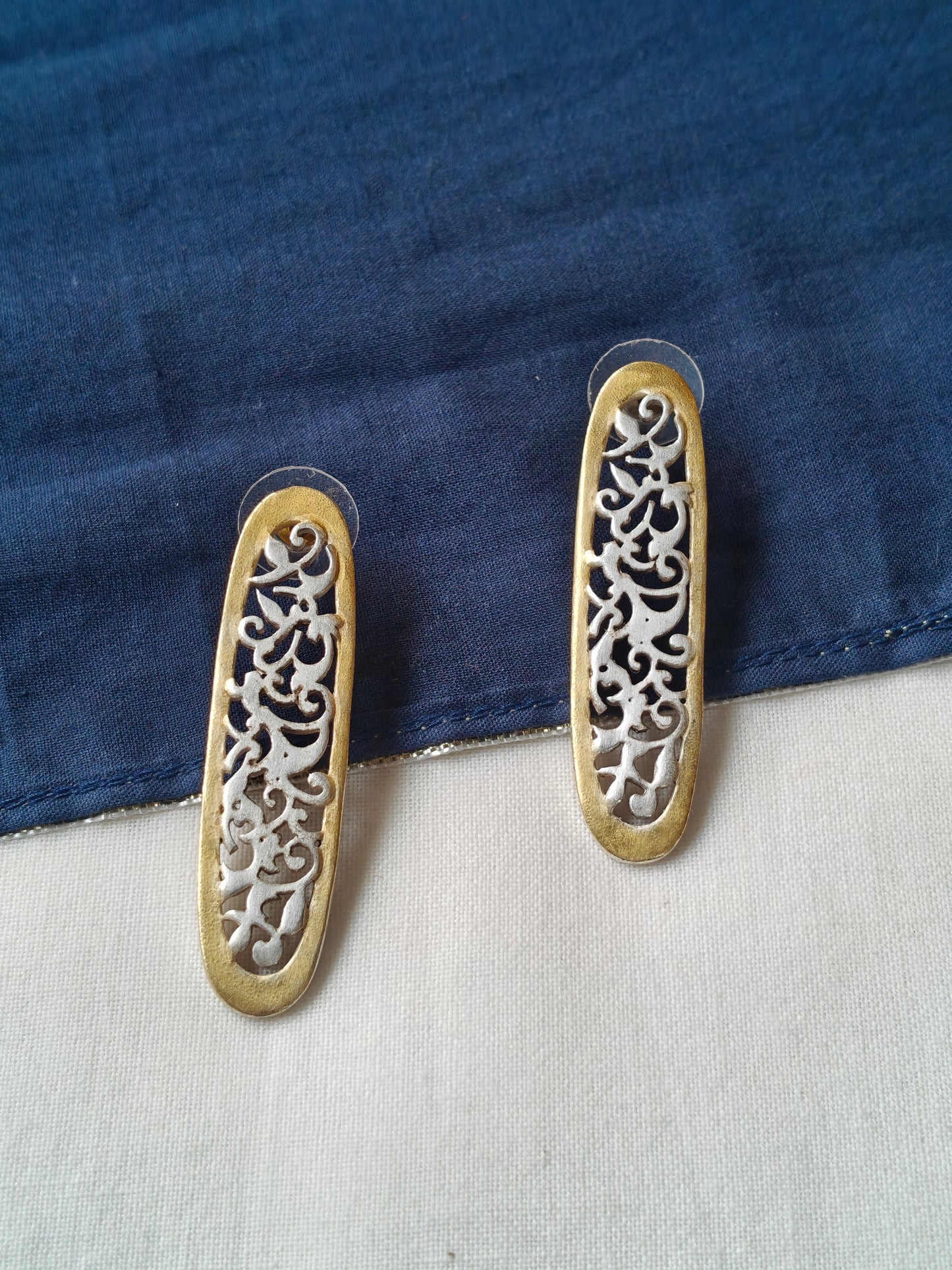 Oval shaped silver and gold dual tone stud earrings - 92.5 Sterling silver