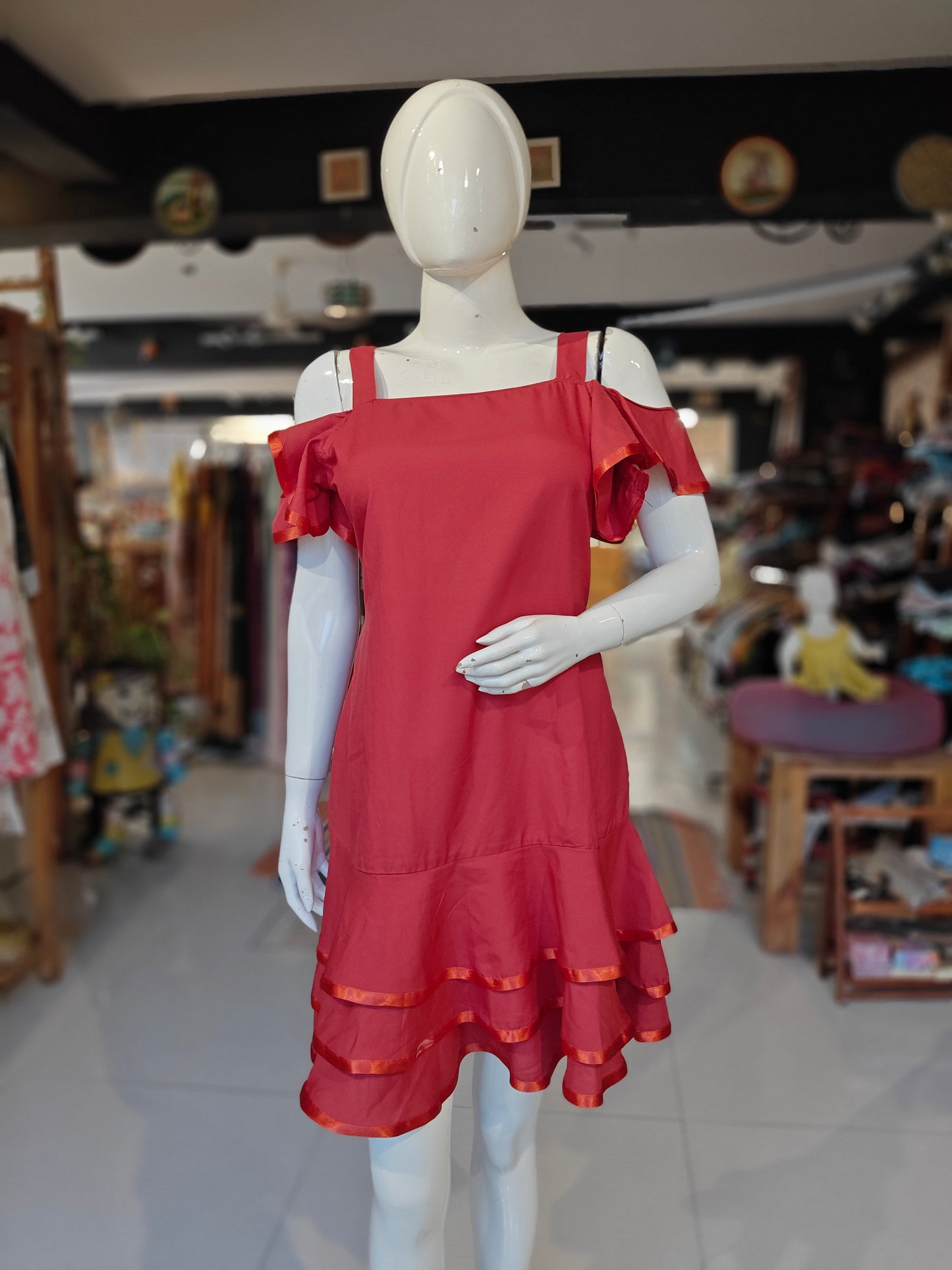 Red cold-shoulder dress with ruffled hem ribbon trims