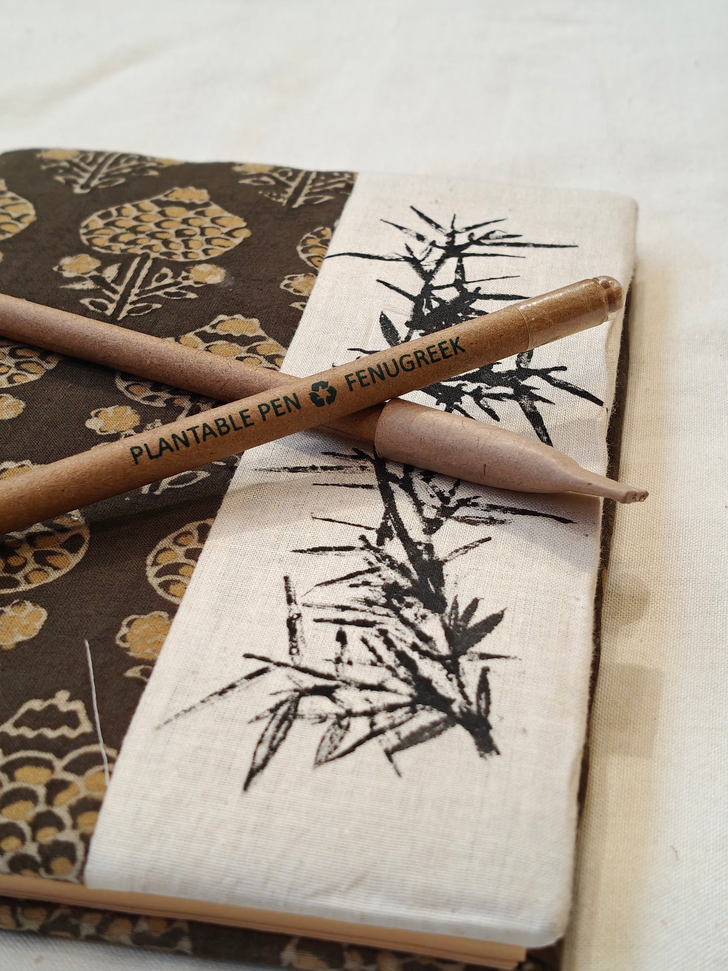 Handcrafted plantable pen with seeds at the bottom