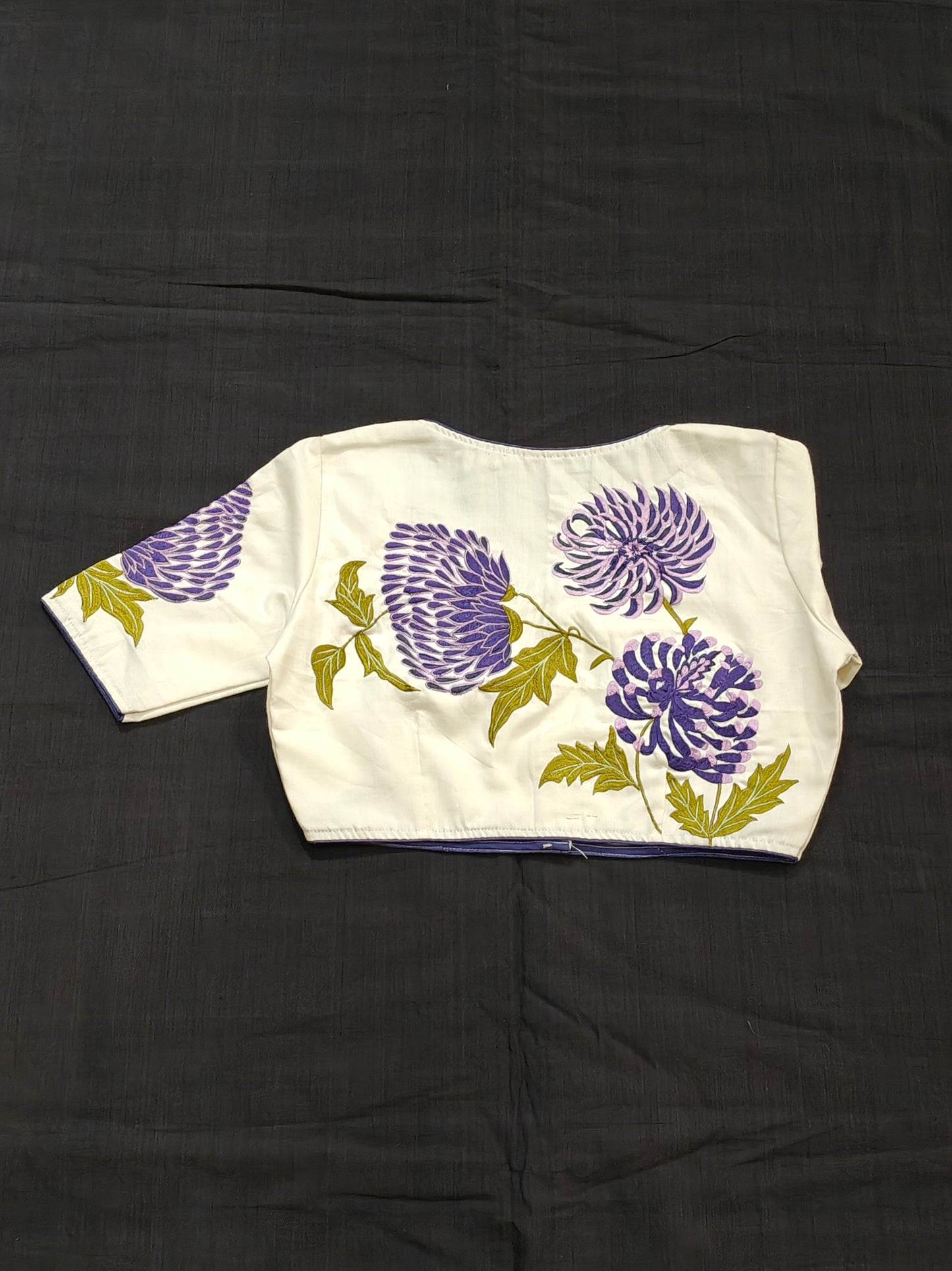 White elbow sleeved blouse with purple flowers embroidered back and sleeves - front open