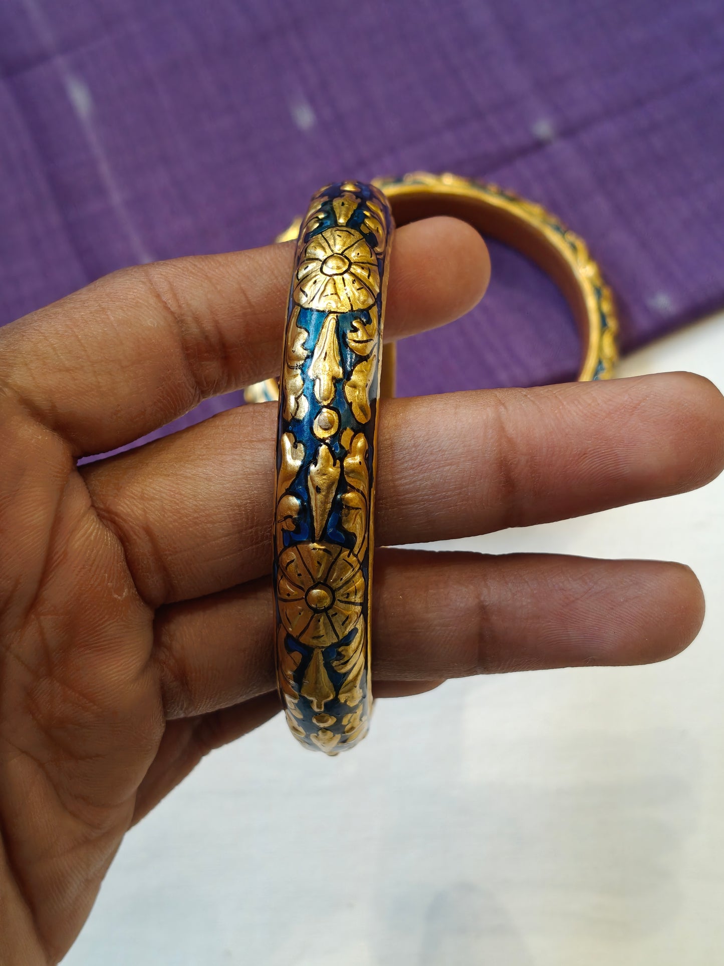 Blue gold leaf embossed pair of bangles with floral design - set of 2