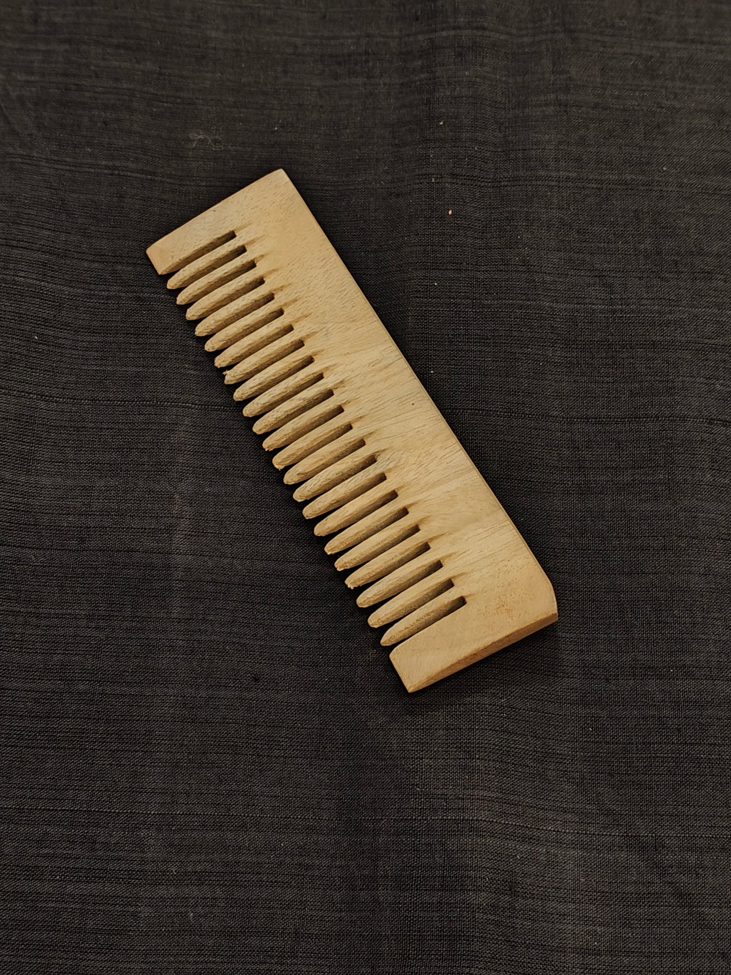 Handcrafted Neem Wood combs in different styles - click to see