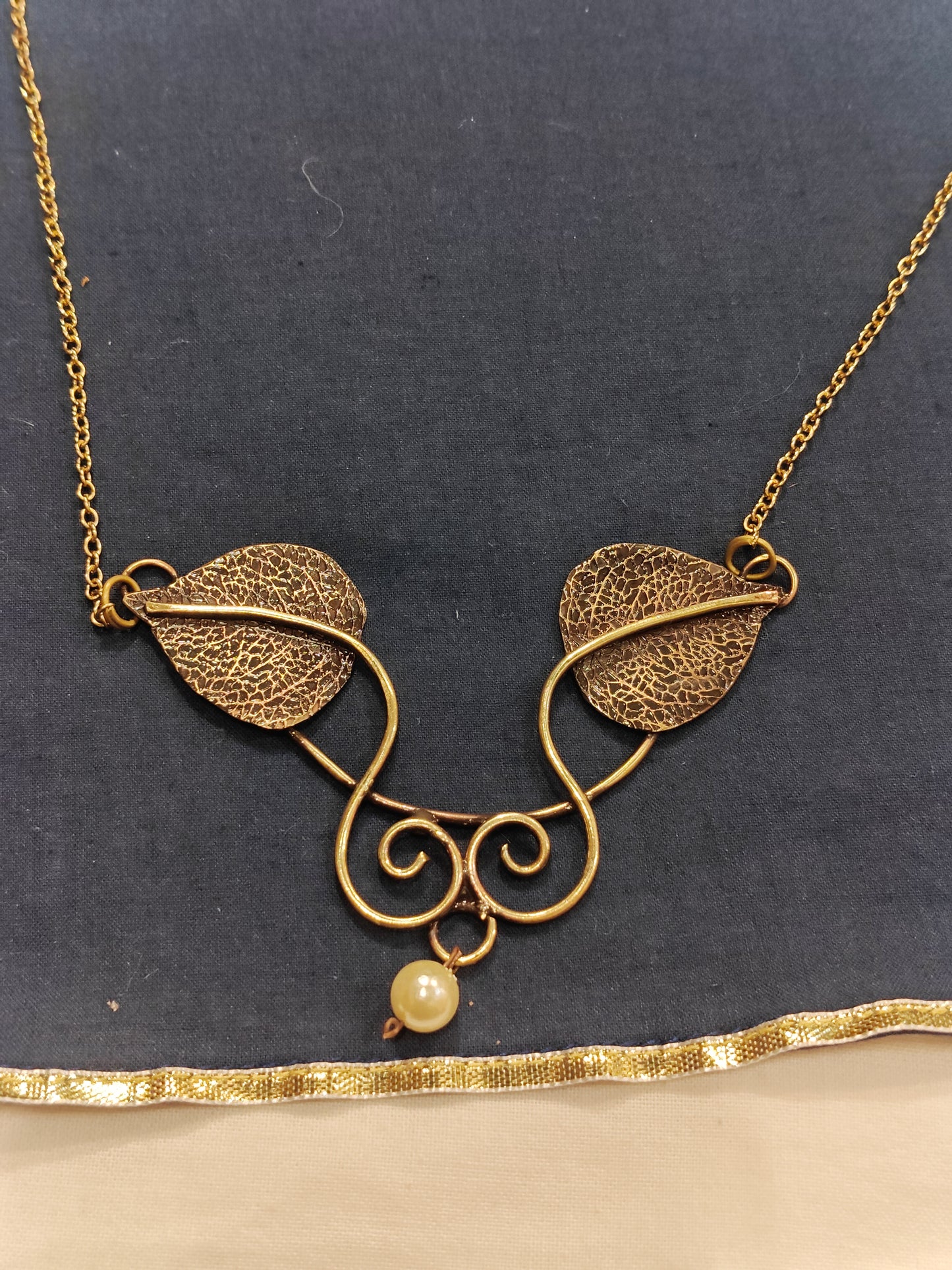 Two leaves with a pearl drop chain necklace - handcrafted in copper and brass