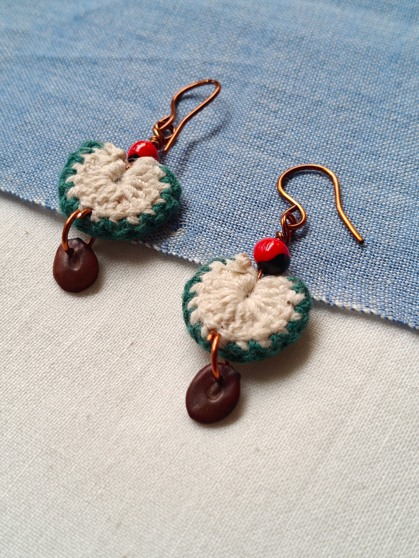 Handcrafted seed earrings with copper hooks