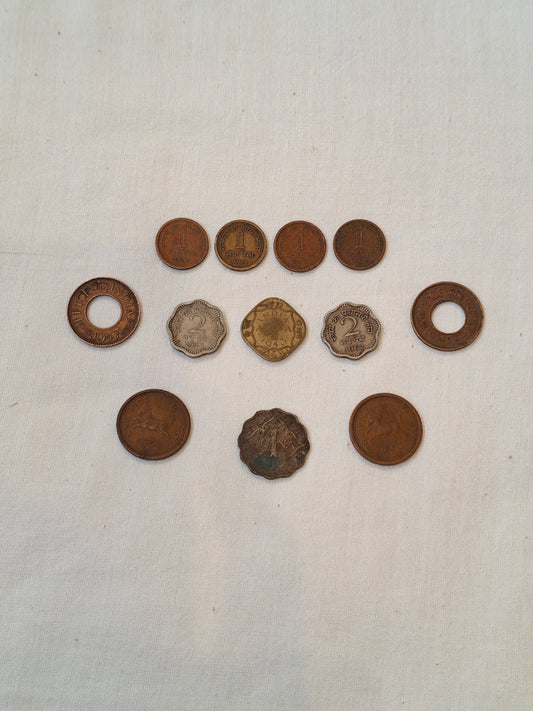 Historic collection of coins from The British Raj and early post independence days - click to see different coins