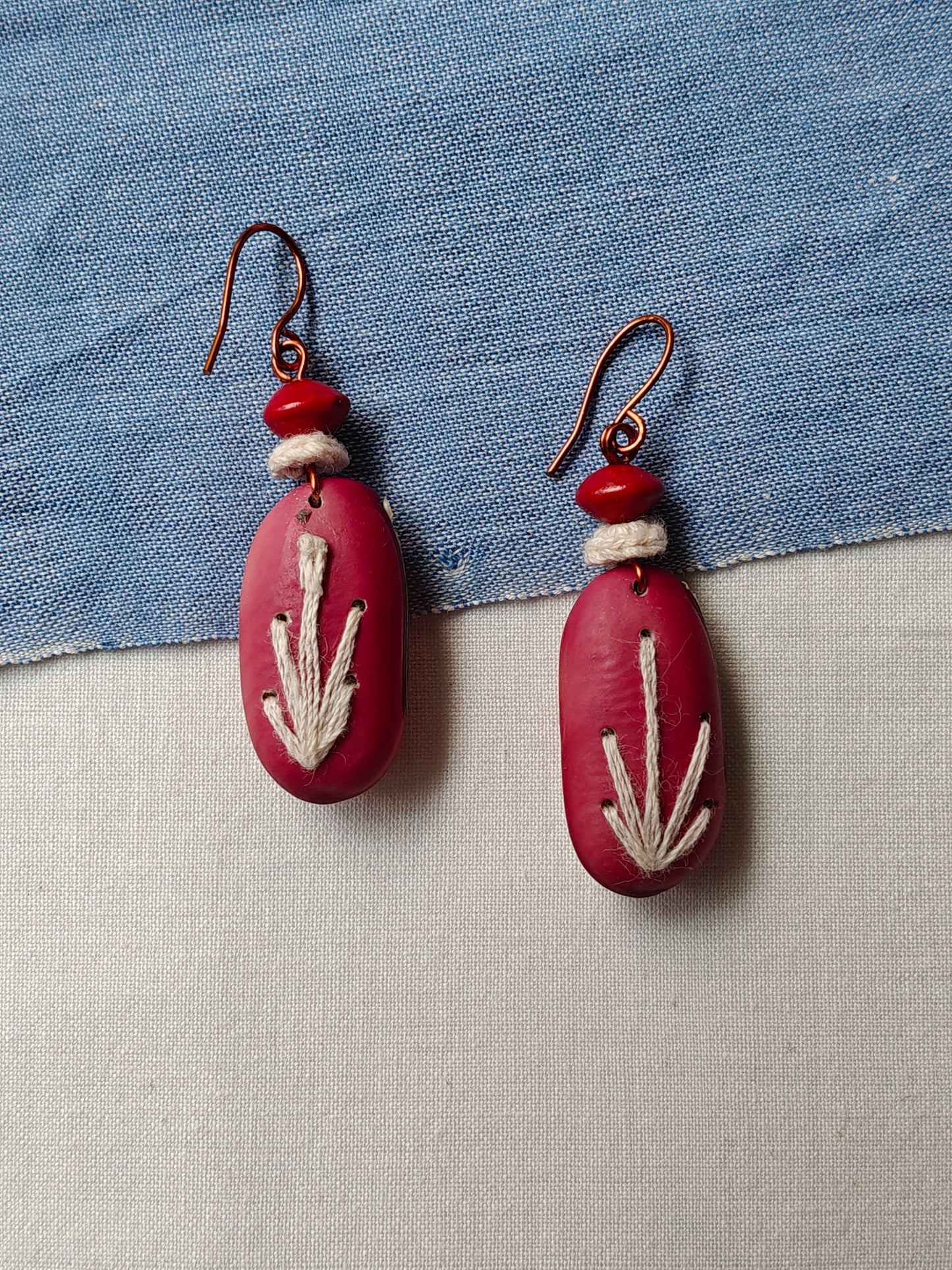 Handcrafted seed earrings with copper hooks
