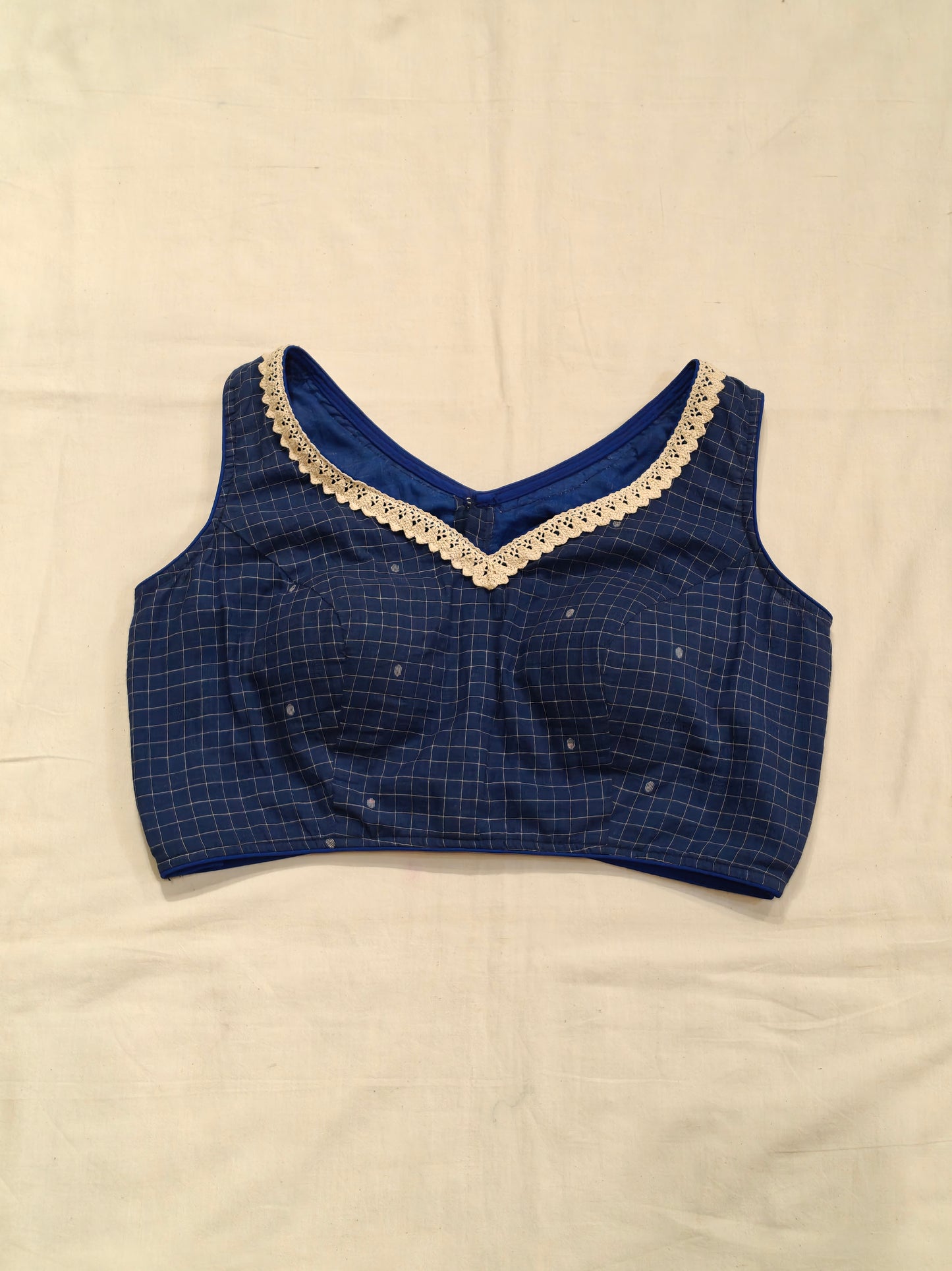 Blue Jamdani handloom cotton checkered sleeveless blouse with lace trims