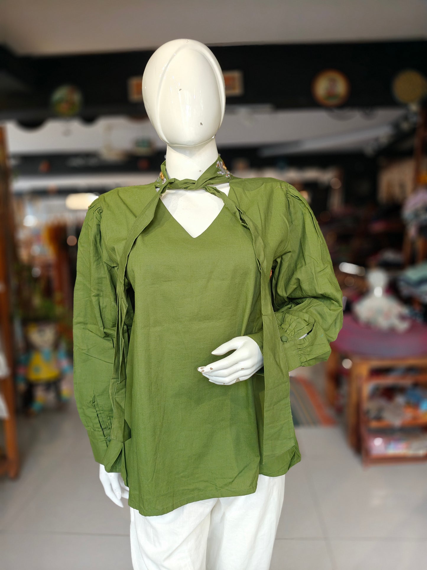 Green cotton top with embroidered collar and long sleeves