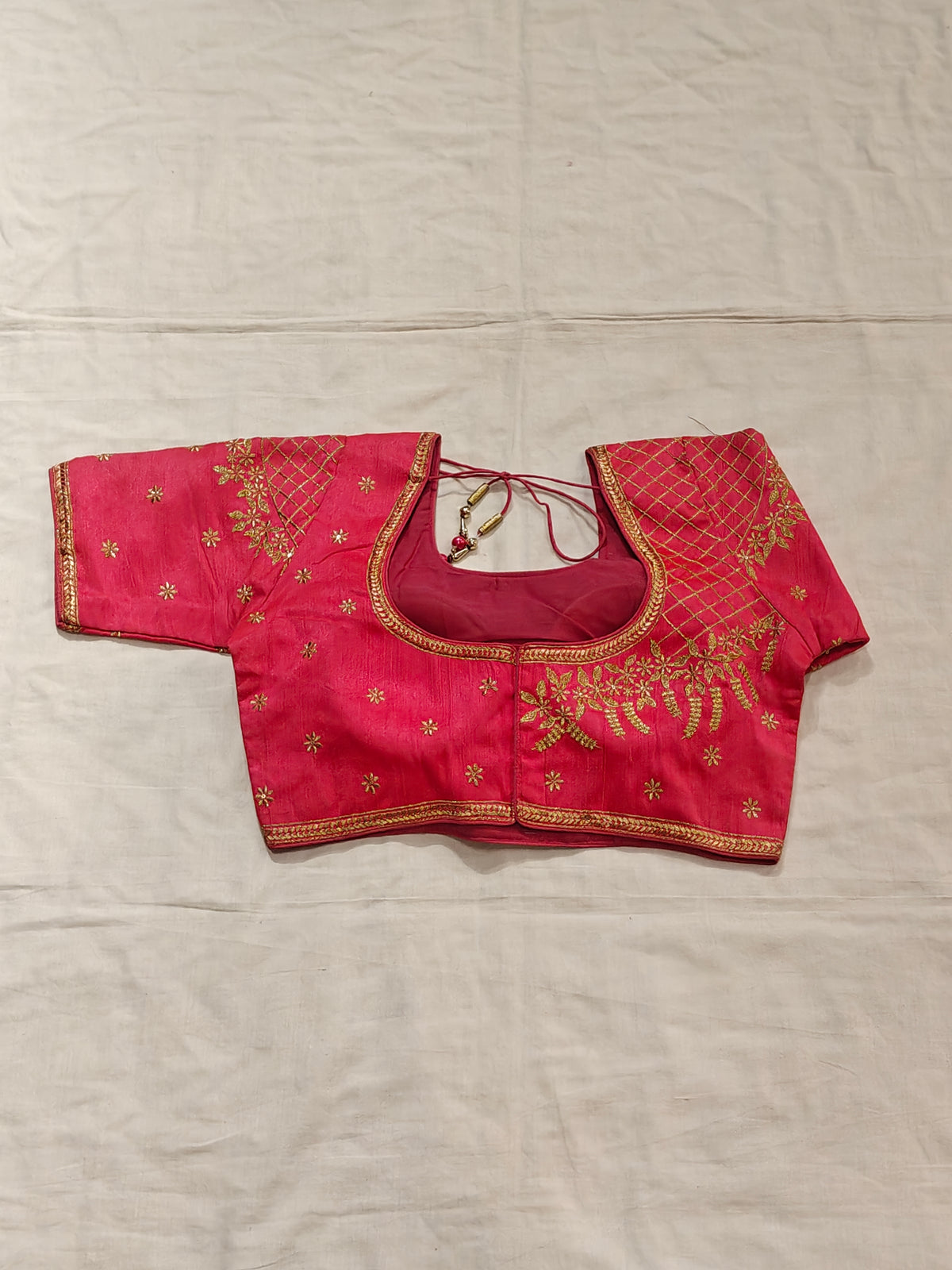 Saree blouse with gold zari embroidery and floral motifs - click to see colors