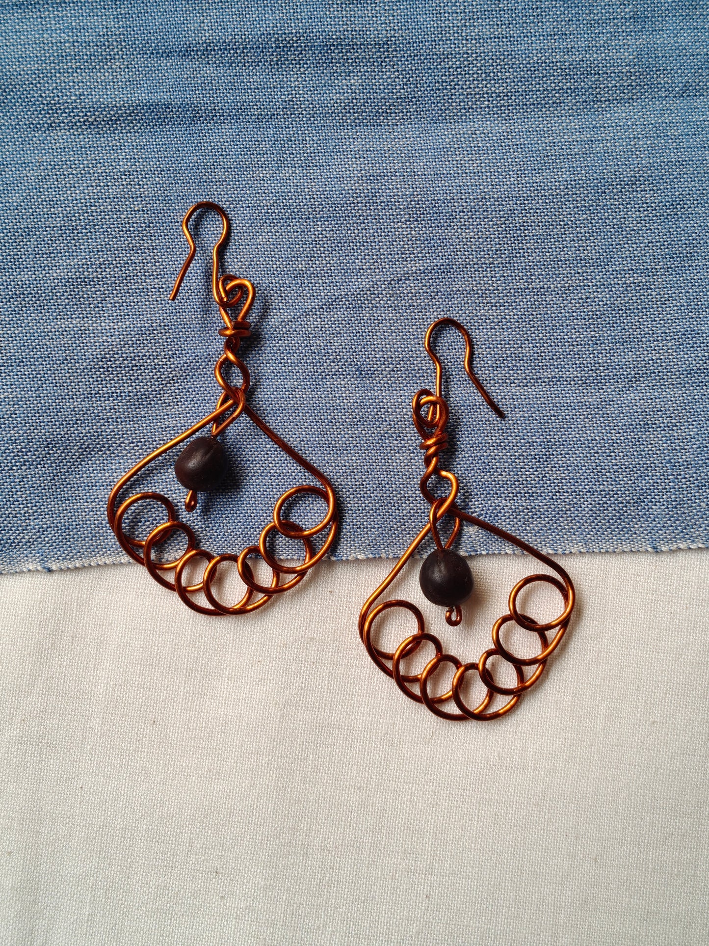 Handcrafted seed earrings with copper hooks