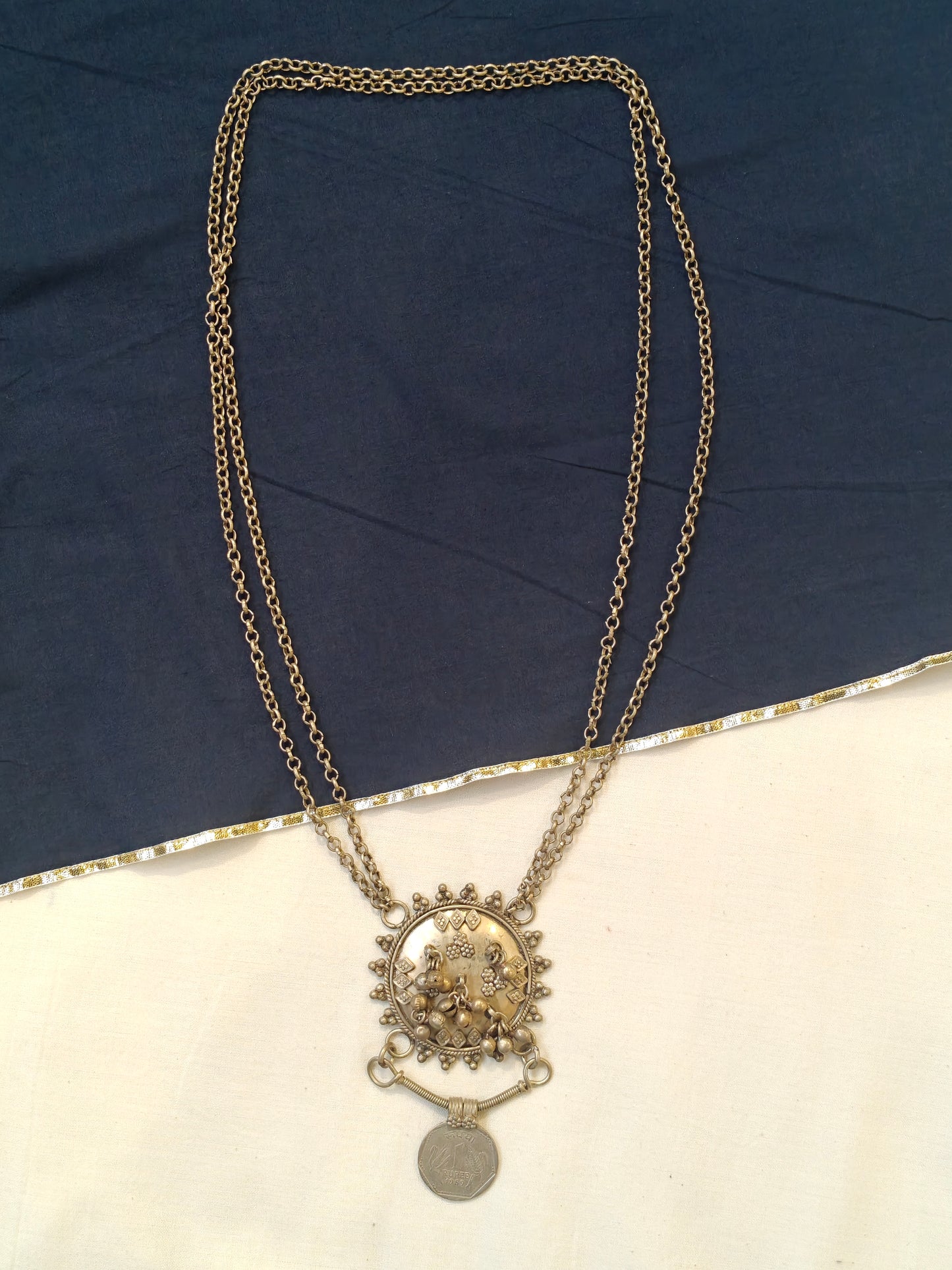 Circular pendant with ghungroos and 1 rupee coin handcrafted necklace