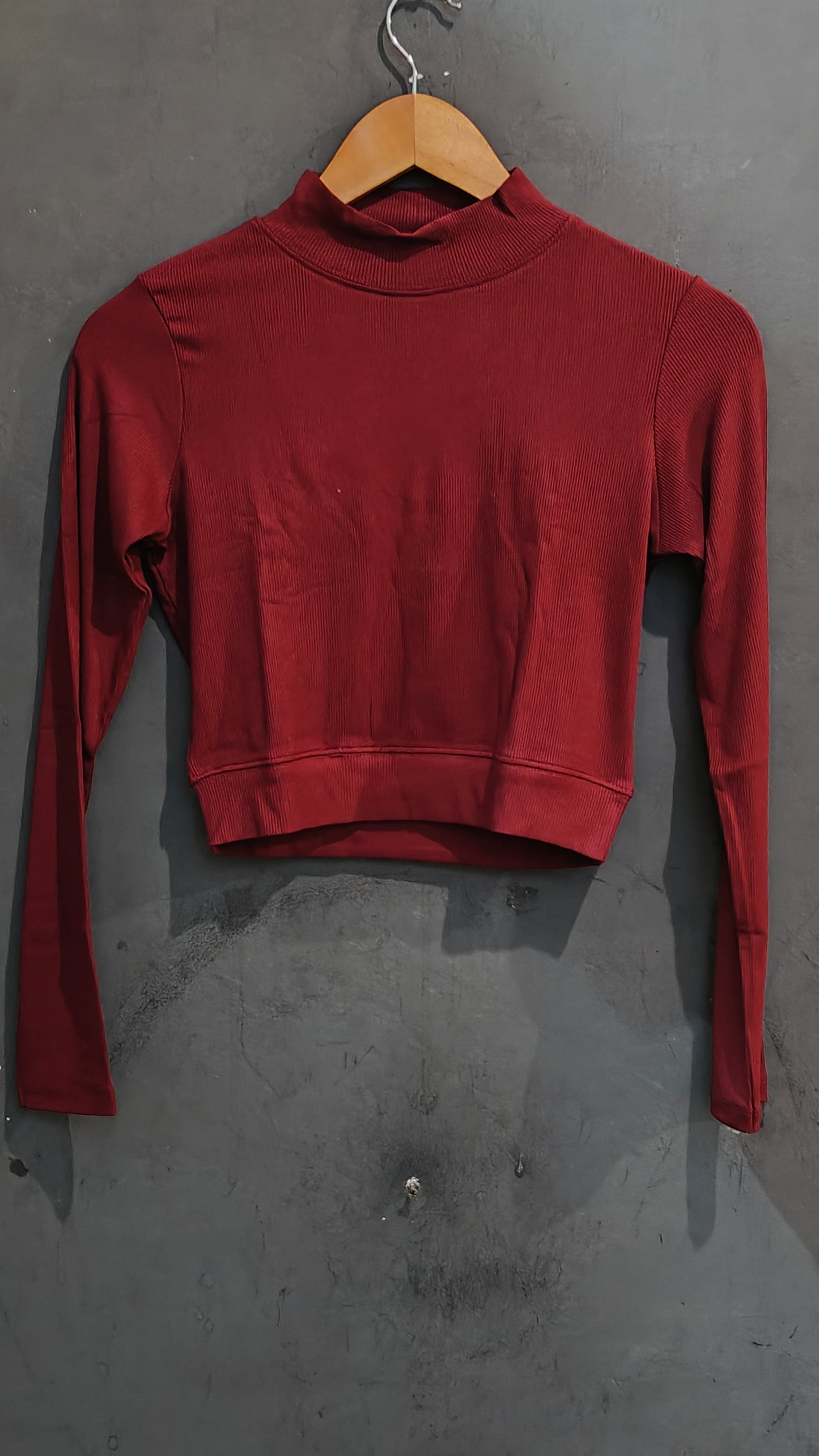 Textured stretchable full sleeves closed neck blouse