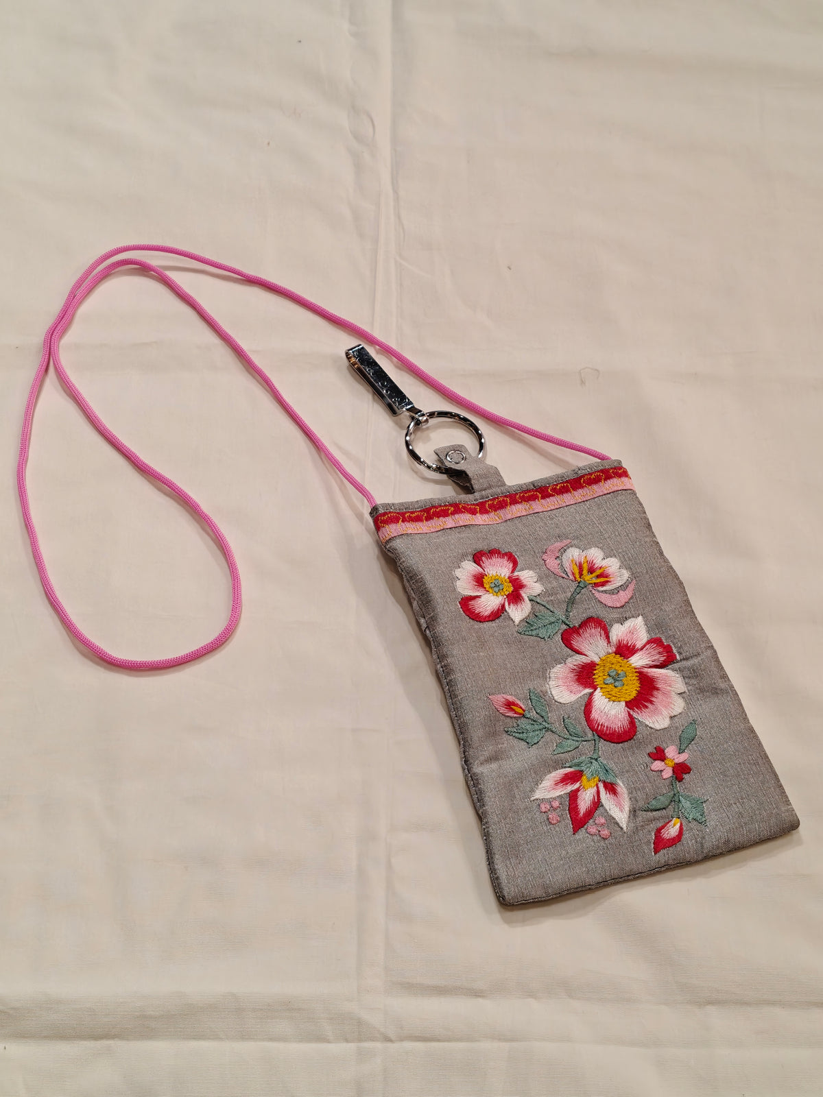 Silk embroidered phone pouches with waist clip on and a sling - multiple options available