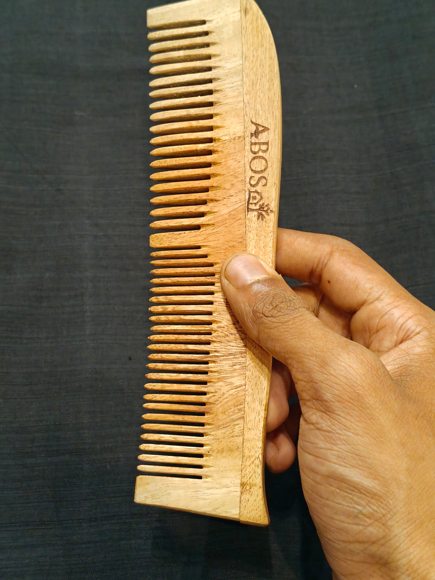 Handcrafted Neem Wood combs in different styles - click to see