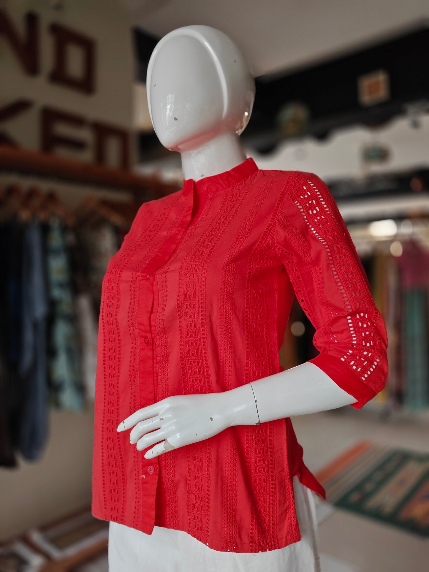 Red cotton shirt top featuring schiffli embroidery
