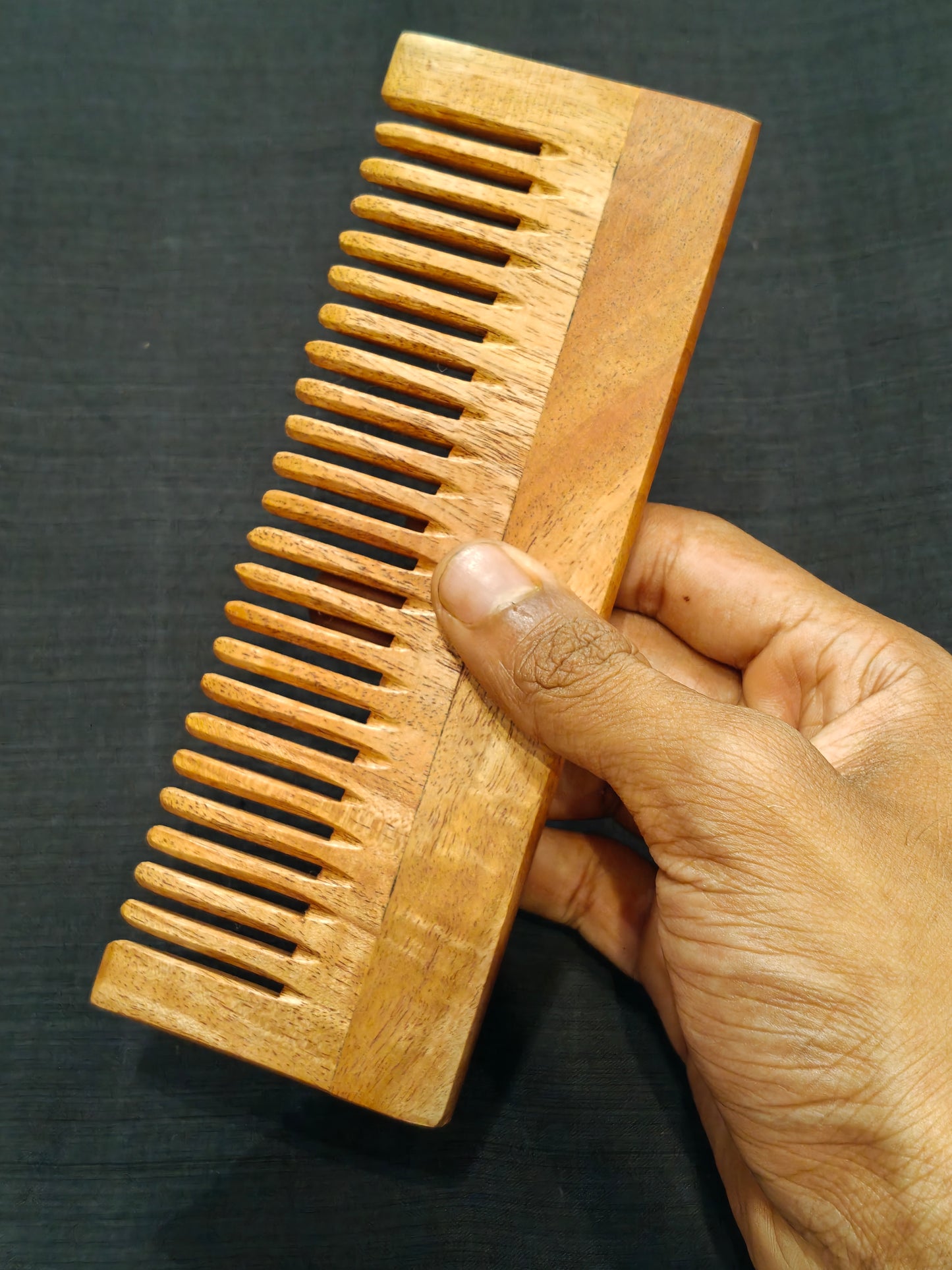 Handcrafted Neem Wood combs in different styles - click to see