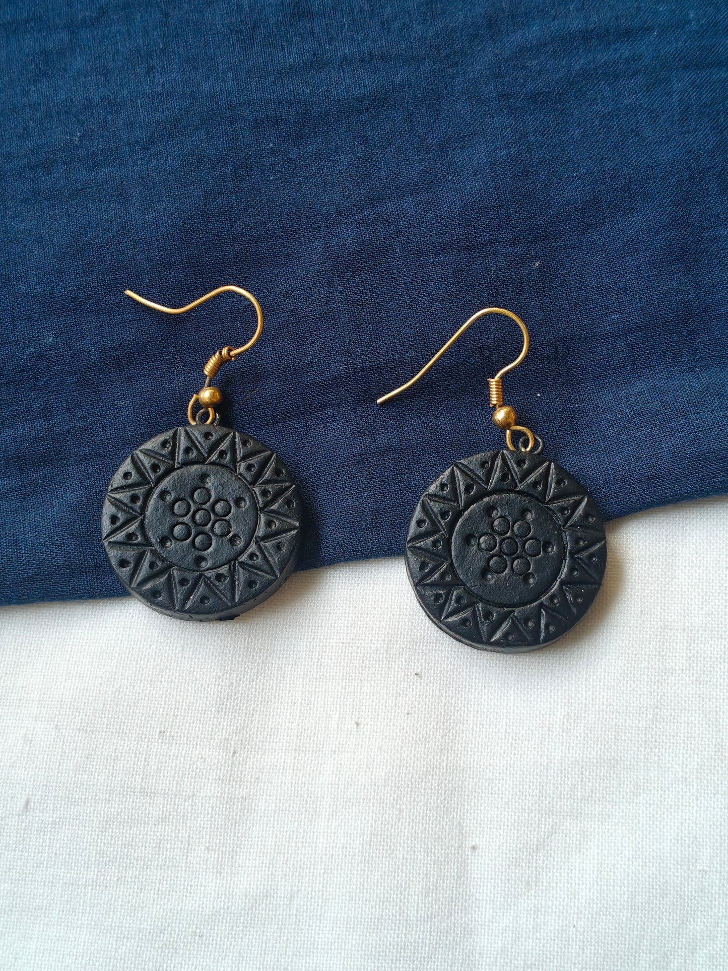 Scorching sun in black handcrafted, handpainted terracotta hook earrings