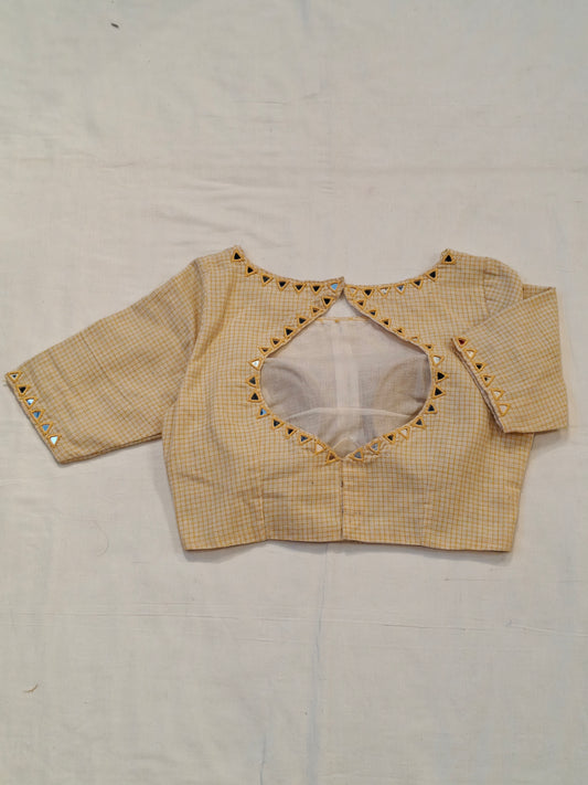 Yellow handloom kala cotton checks elbow sleeves blouse with mirror work