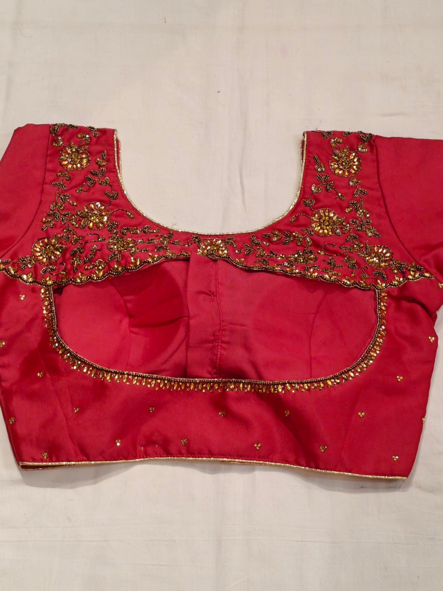 Art silk blouse with stone work and hand embroidery on back