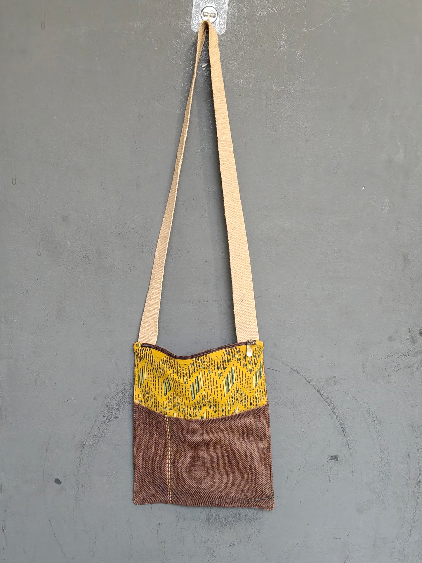 Handmade crossbody sling bag with multicolour fabric panels and jute