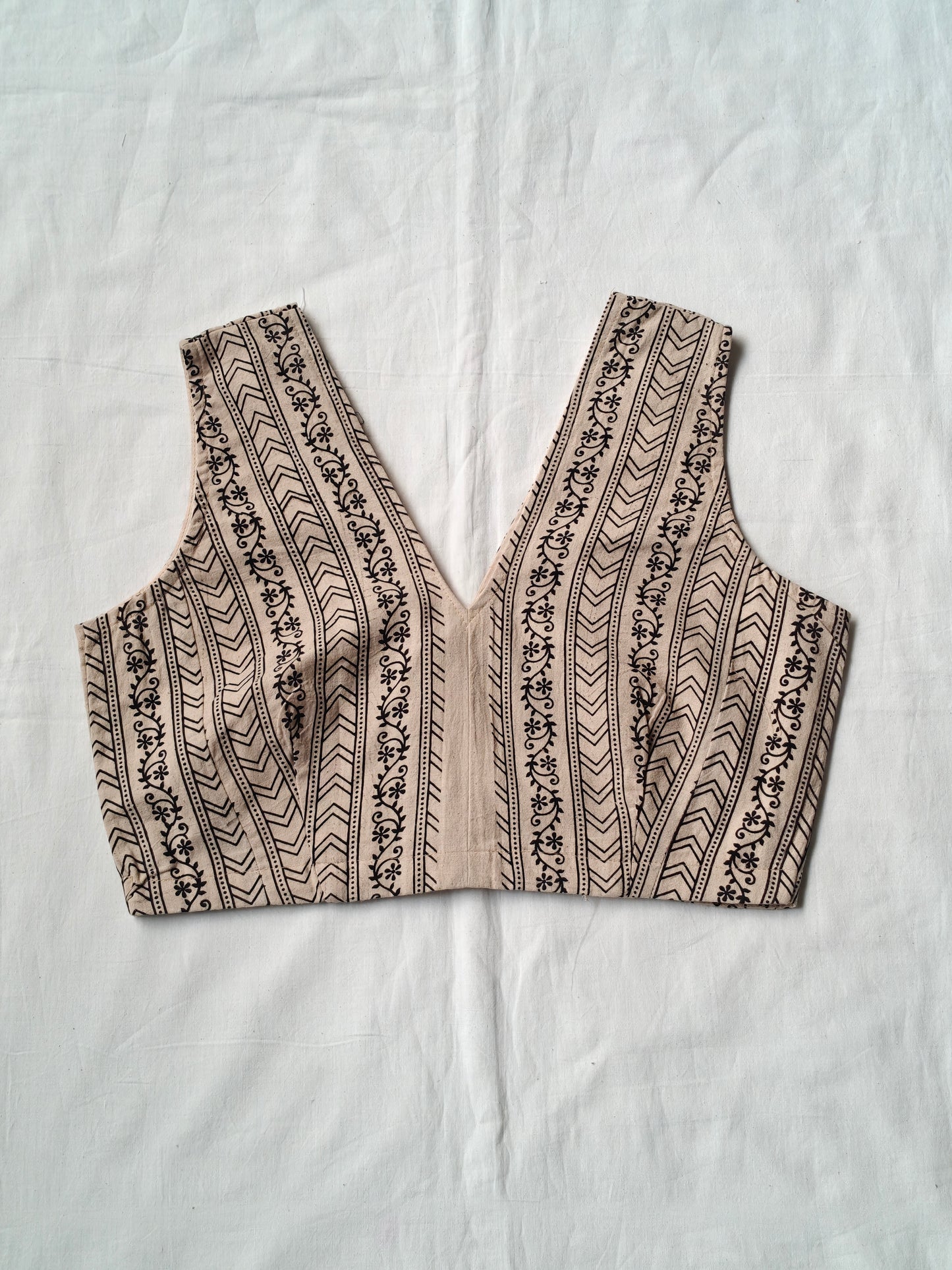 Beige handblock printed cotton v-neck blouse with vine patterns