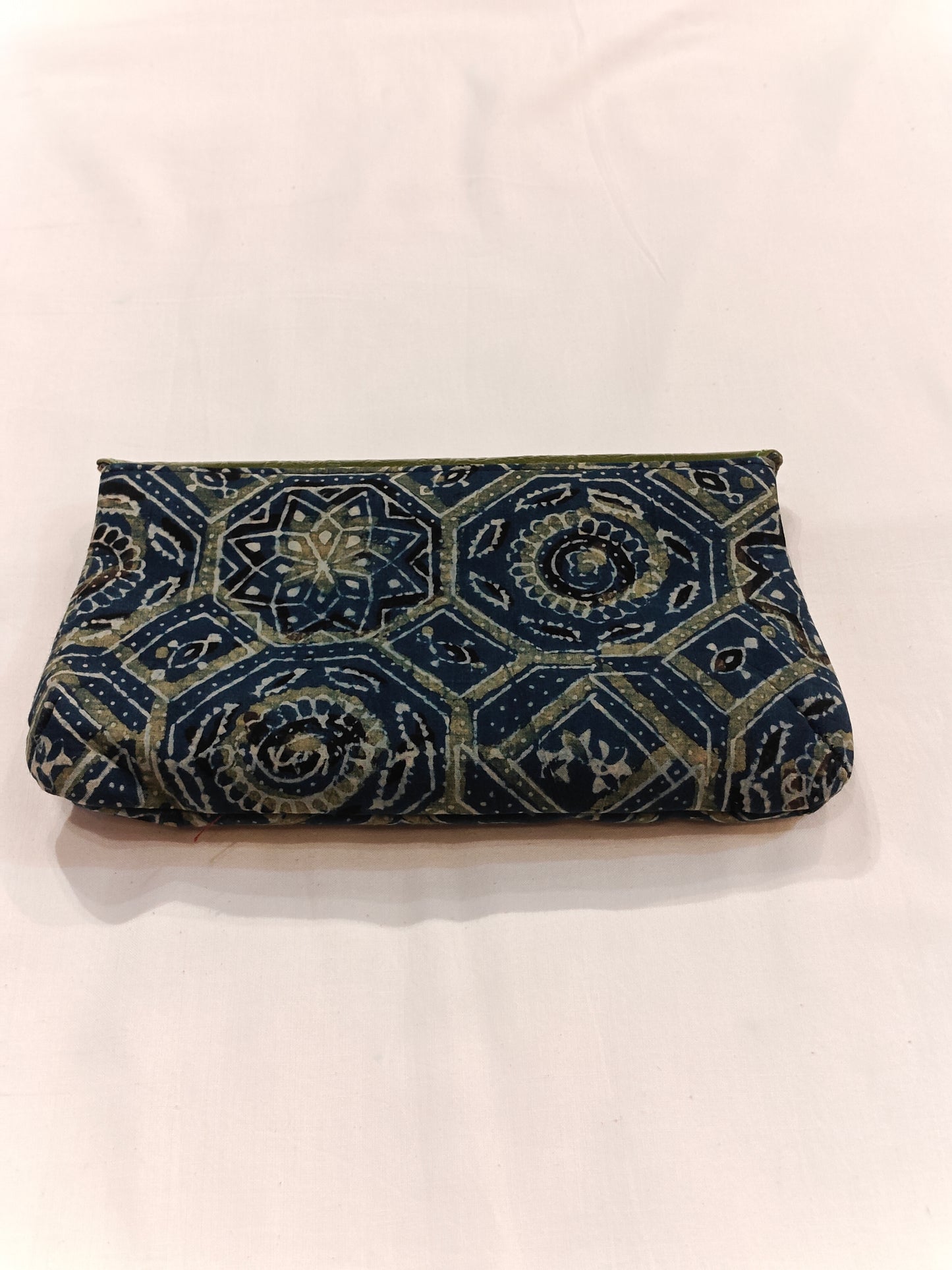 Leather hand embossed flap purse with hand block printed fabric base