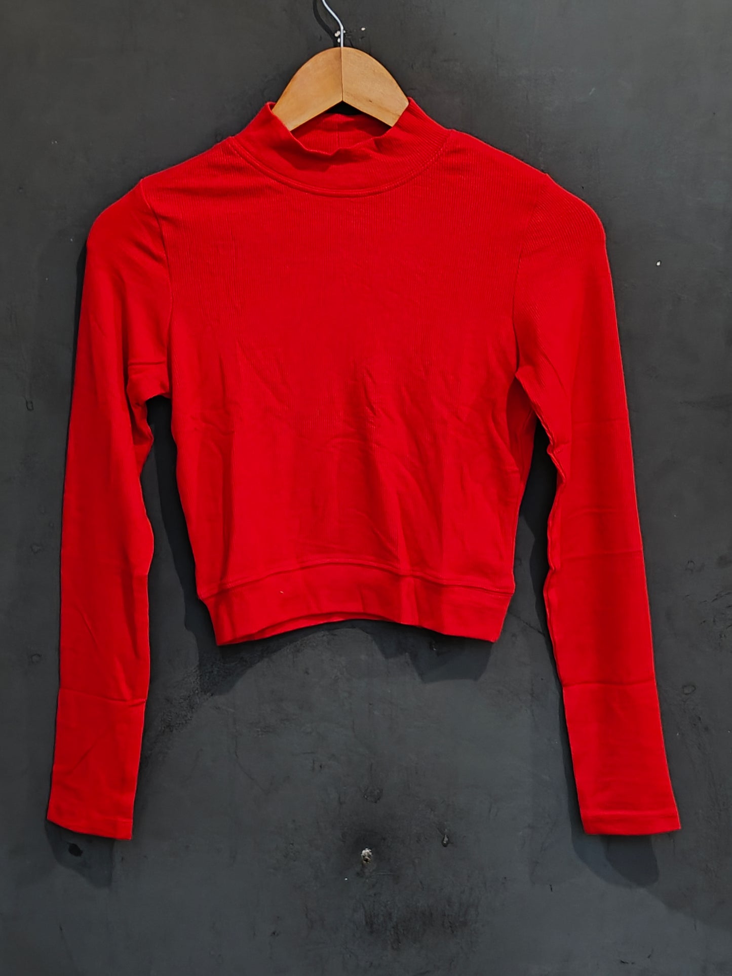 Textured stretchable full sleeves closed neck blouse