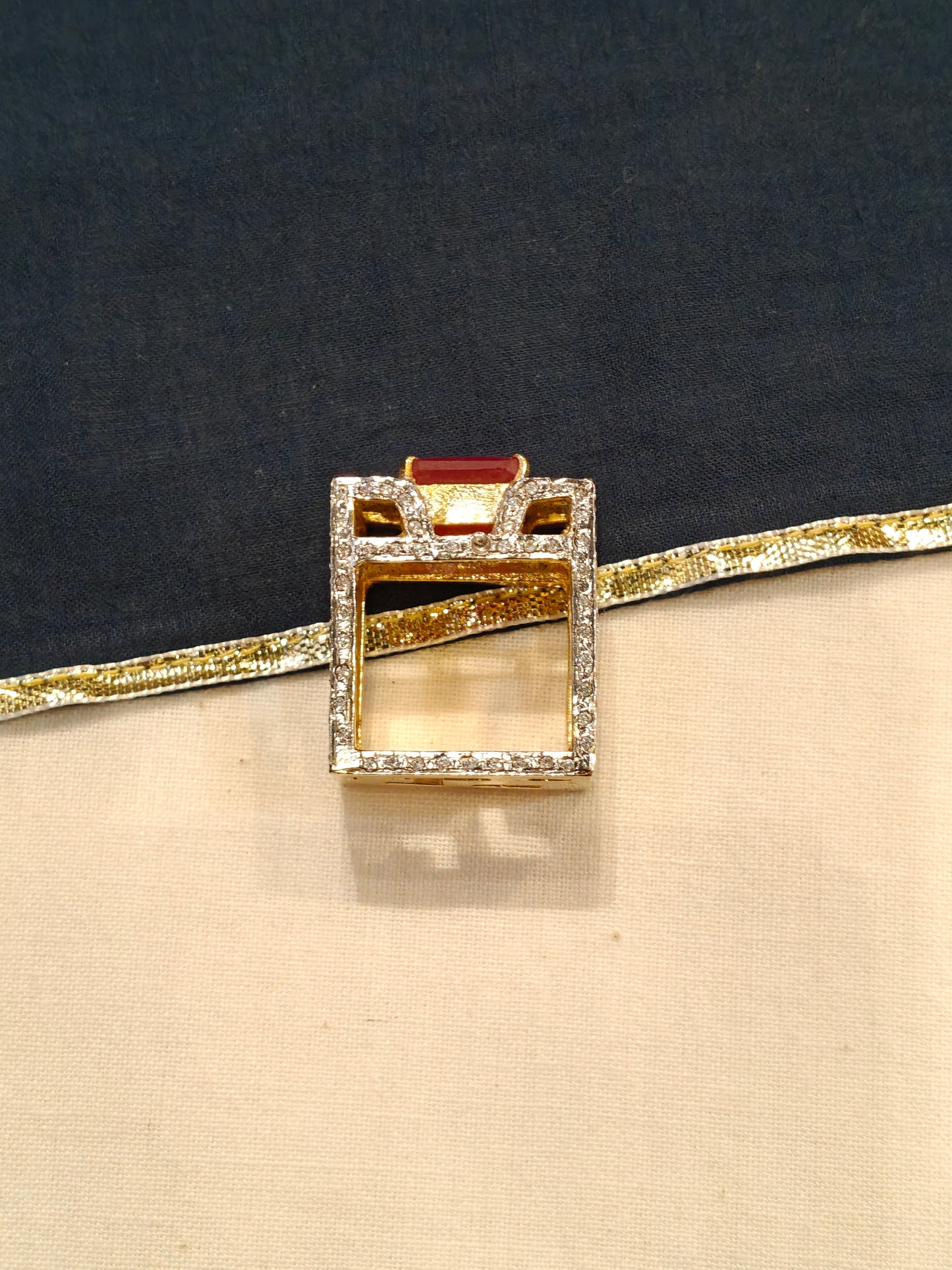 Square shaped finger ring with red stone
