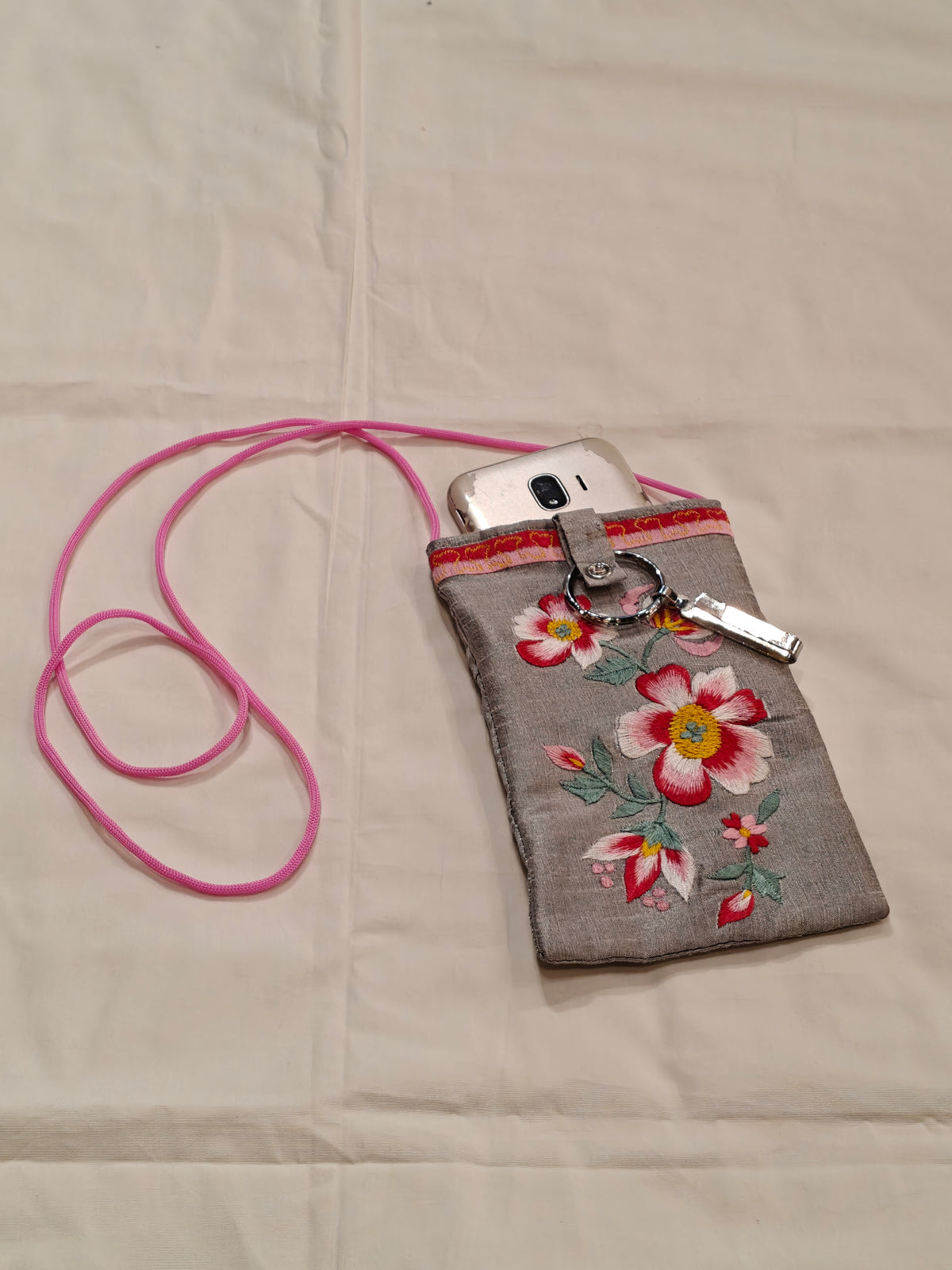 Silk embroidered phone pouches with waist clip on and a sling - multiple options available