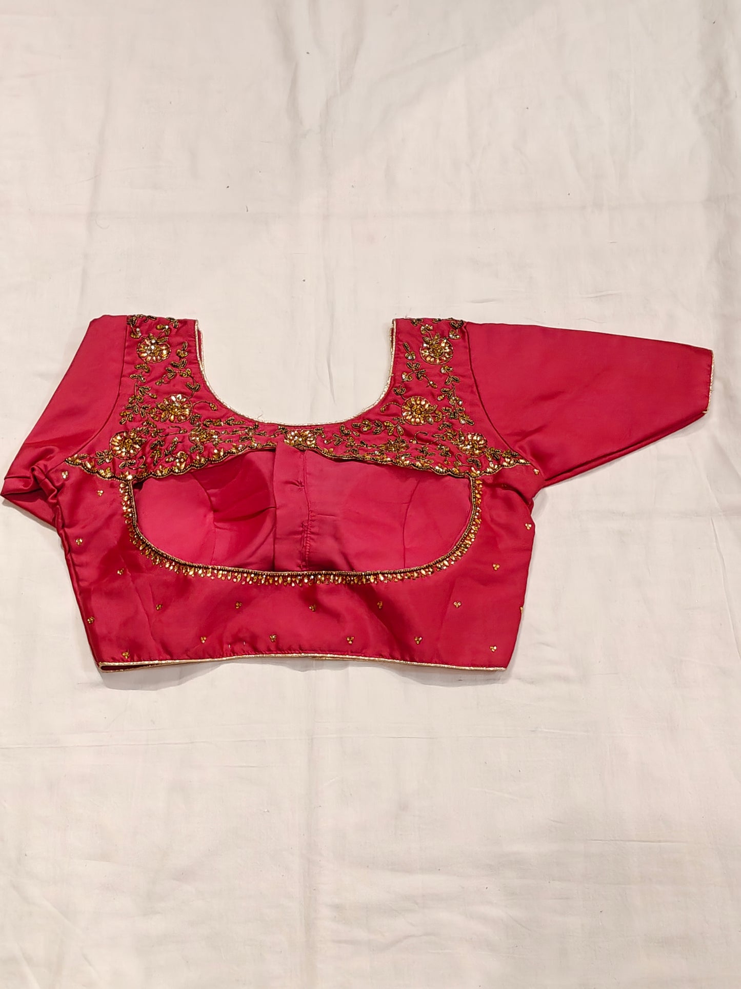 Art silk blouse with stone work and hand embroidery on back