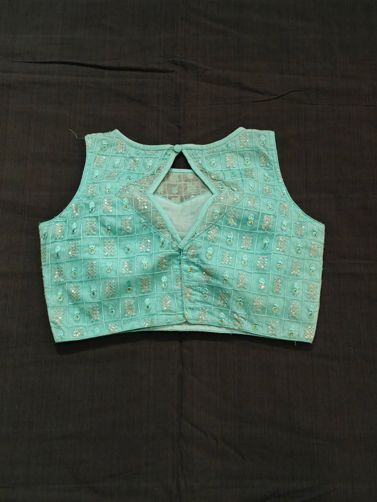 Sea green net sleeveless blouse with embroidery and diamond back - back open
