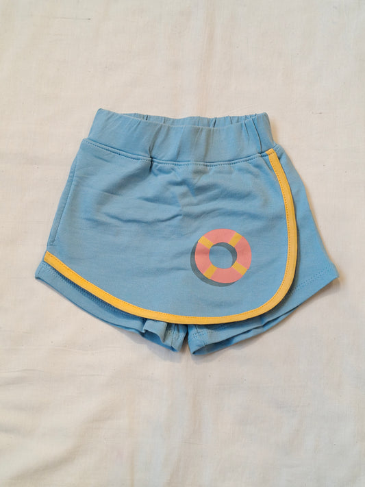 Blue flap style skirt look shorts with a tube print for children