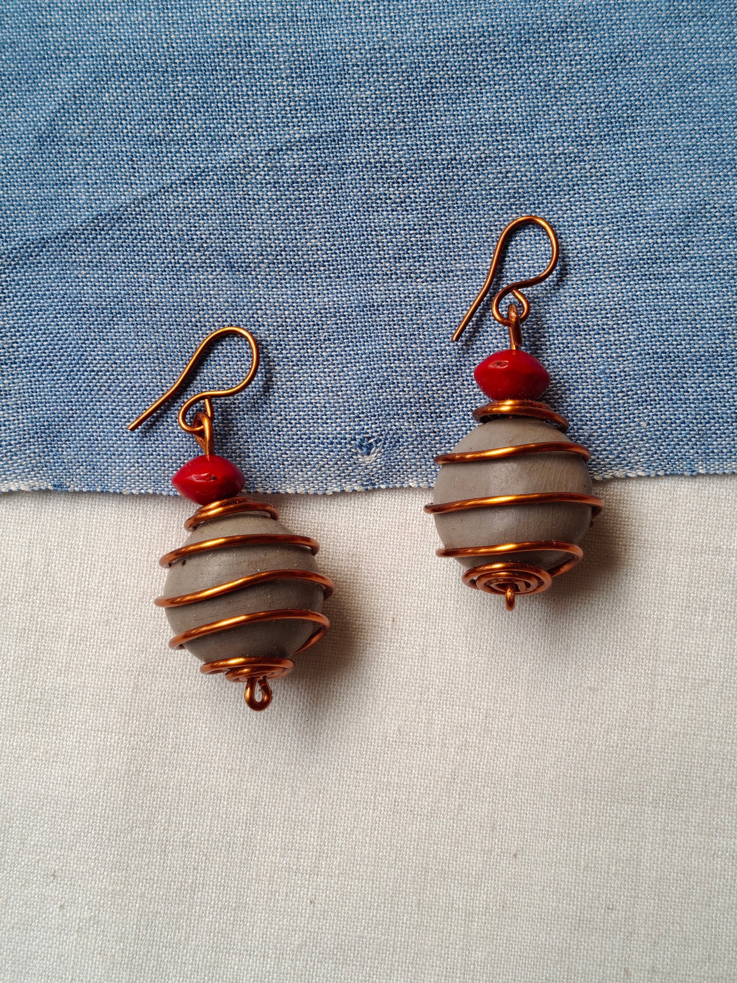 Handcrafted seed earrings with copper hooks
