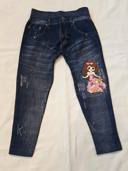 Dark blue jeggings with embroidered doll