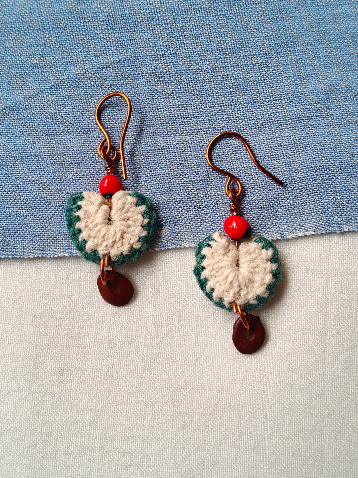 Handcrafted seed earrings with copper hooks