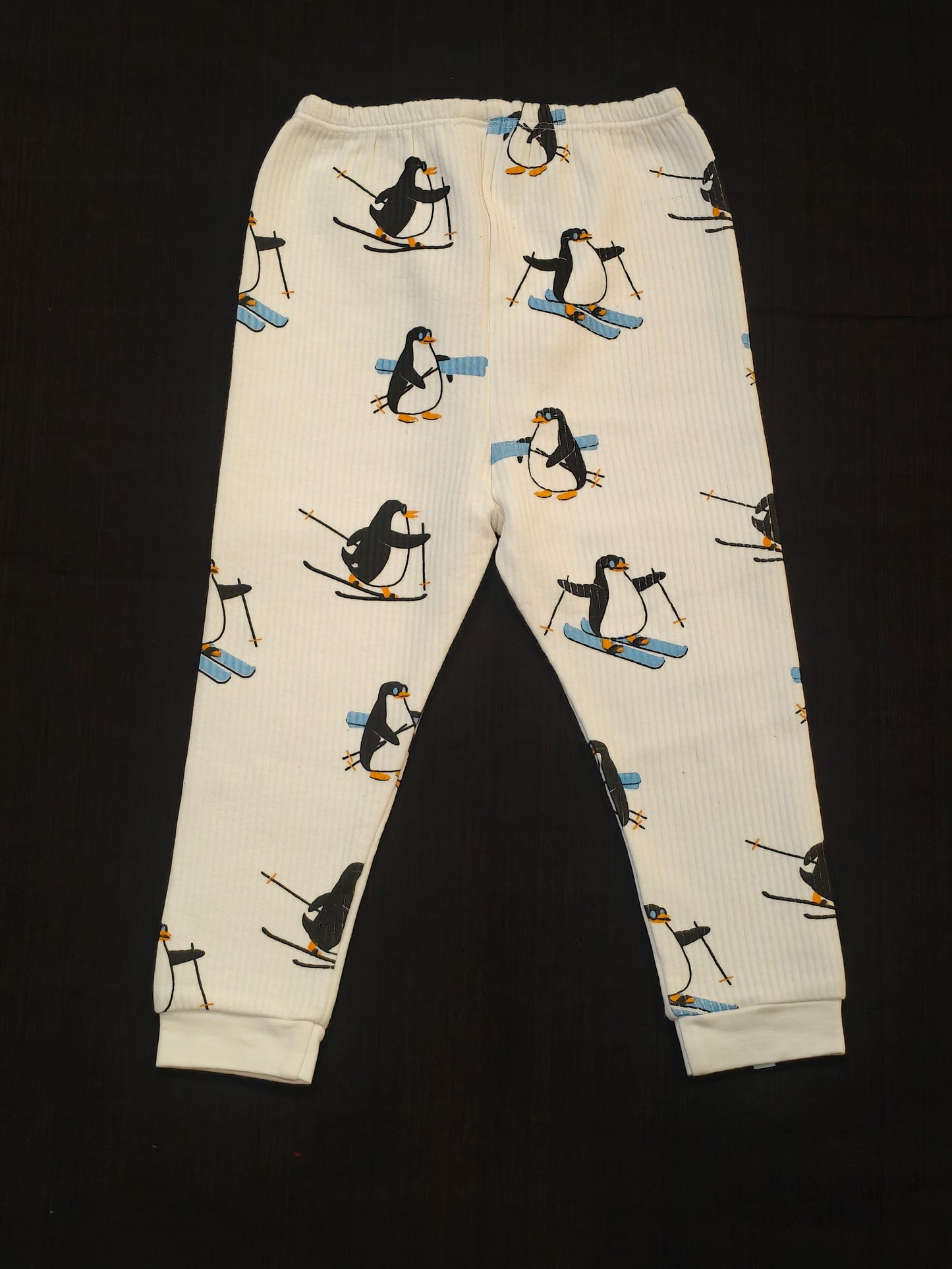 White thermal pants for kids with penguin prints