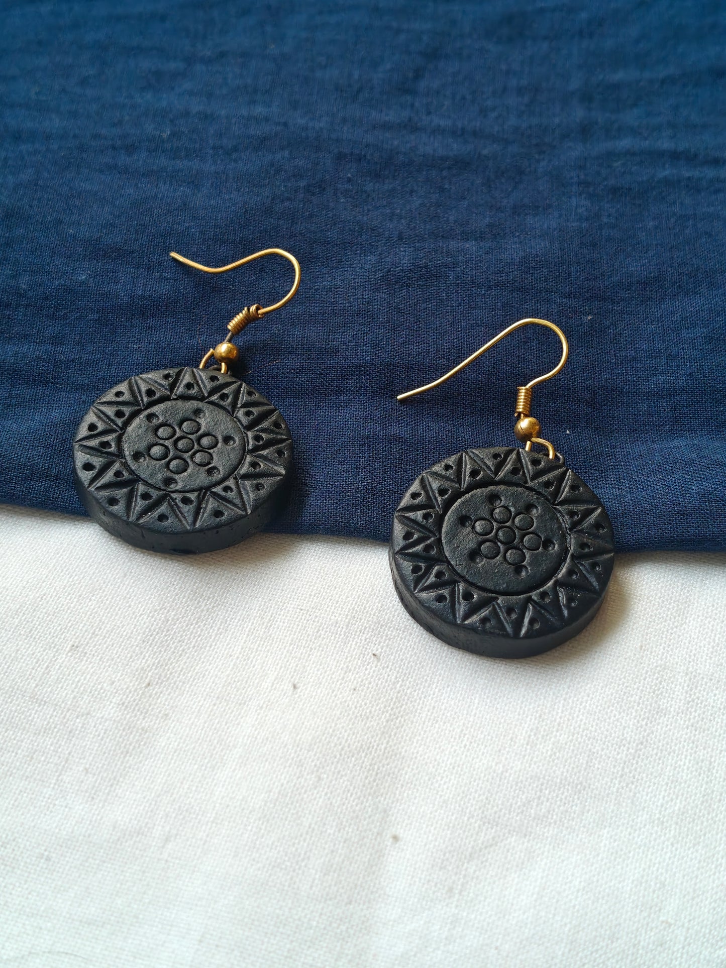 Scorching sun in black handcrafted, handpainted terracotta hook earrings