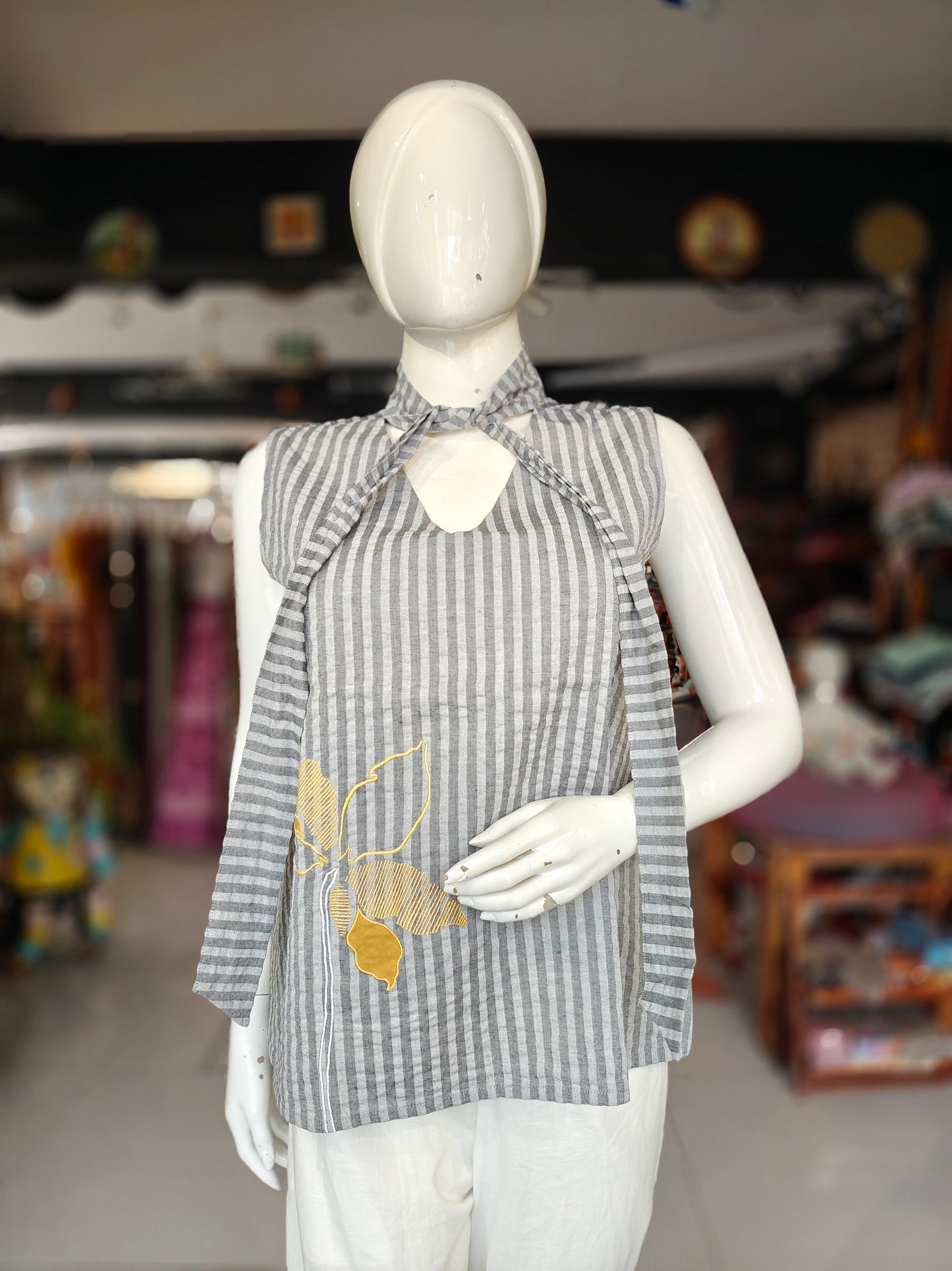 Grey striped and embroidered cotton top with tie up neck