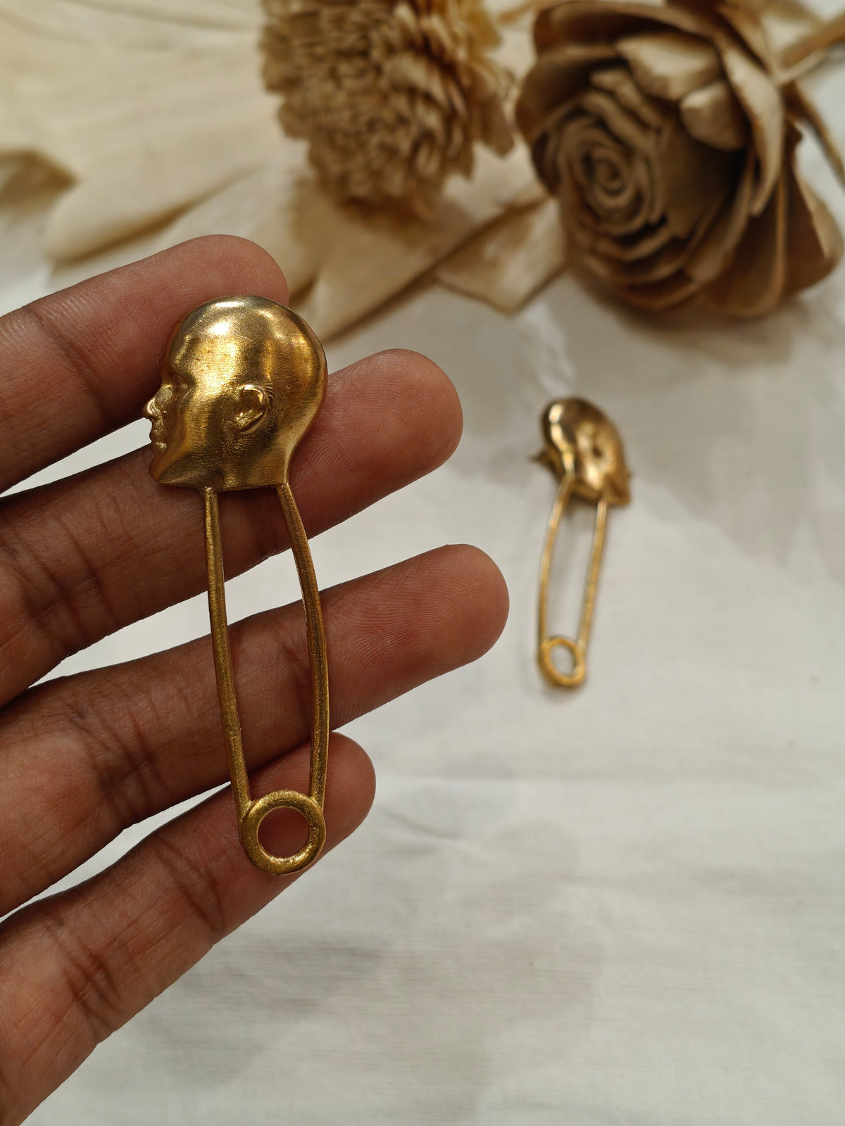 Human head safety pin design brass stud earrings