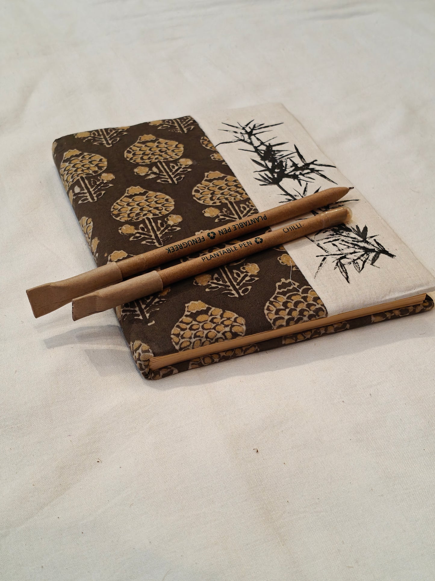Handcrafted plantable pen with seeds at the bottom