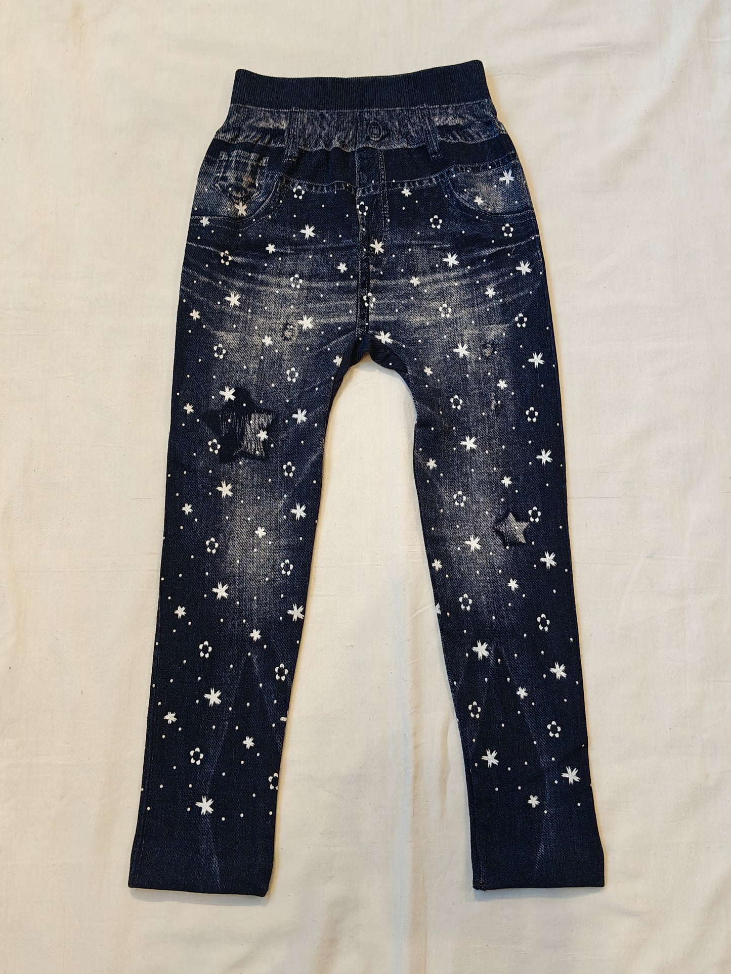 Blue denim style jeggings for children with flowers prints