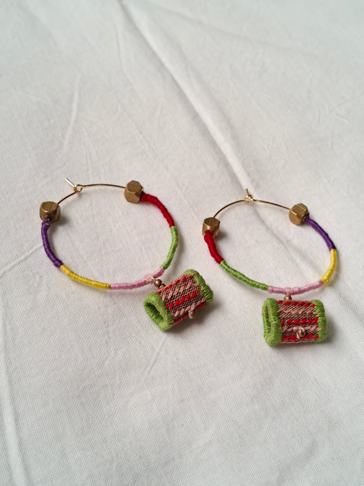 Colorful thread-wrapped hoops with brass beads - handcrafted earrings